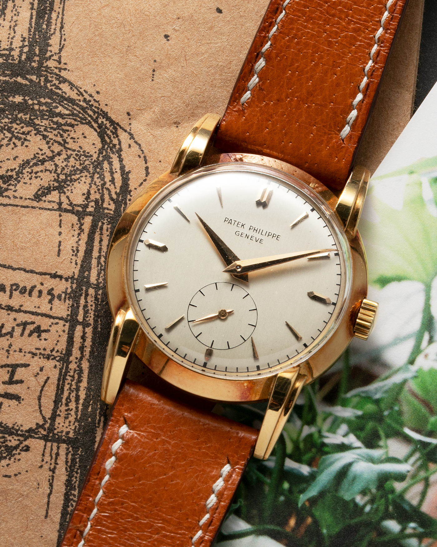 Brand: Patek Philippe Year: 1940 - 1950s Reference Number: 2429 Material: 18-carat Yellow Gold Movement: Cal. 10-200, Manual-Winding Case Diameter: 33mm Bracelet/Strap: Light Brown Nostime Calf Strap with 18k Patek Philippe 18-carat Yellow Gold Tang Buckle