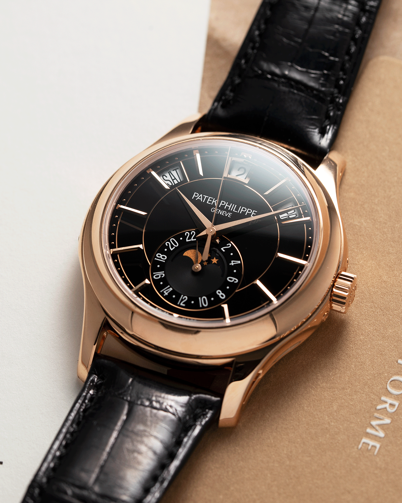 Brand: Patek Philippe Year: 2019 Model: Annual Calendar Reference Number: 5205R Material: 18k Rose Gold Movement: Cal 324 S QA LU 24H Case Diameter: 40mm Bracelet: Nostime Patek Philippe Black Alligator Strap with 18k Rose Gold Tang Buckle