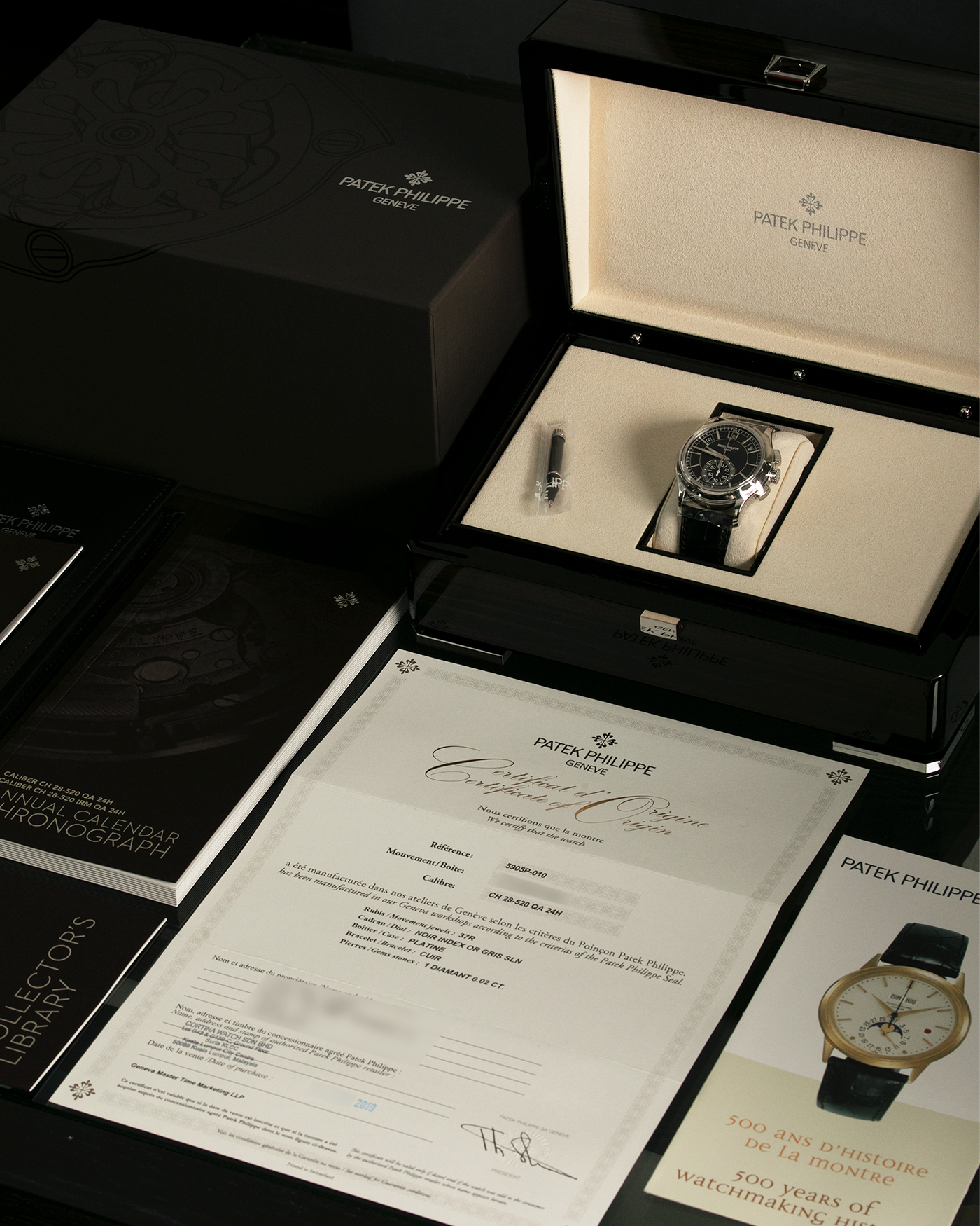 Brand: Patek Philippe Year: 2019 Model: Annual Calendar Chronograph Reference Number: 5905P Material: Platinum Movement: Cal. 28-520 QA 24H Case Diameter: 42mm Bracelet: Patek Philippe Black Alligator Strap with Platinum Signed Tang Buckle