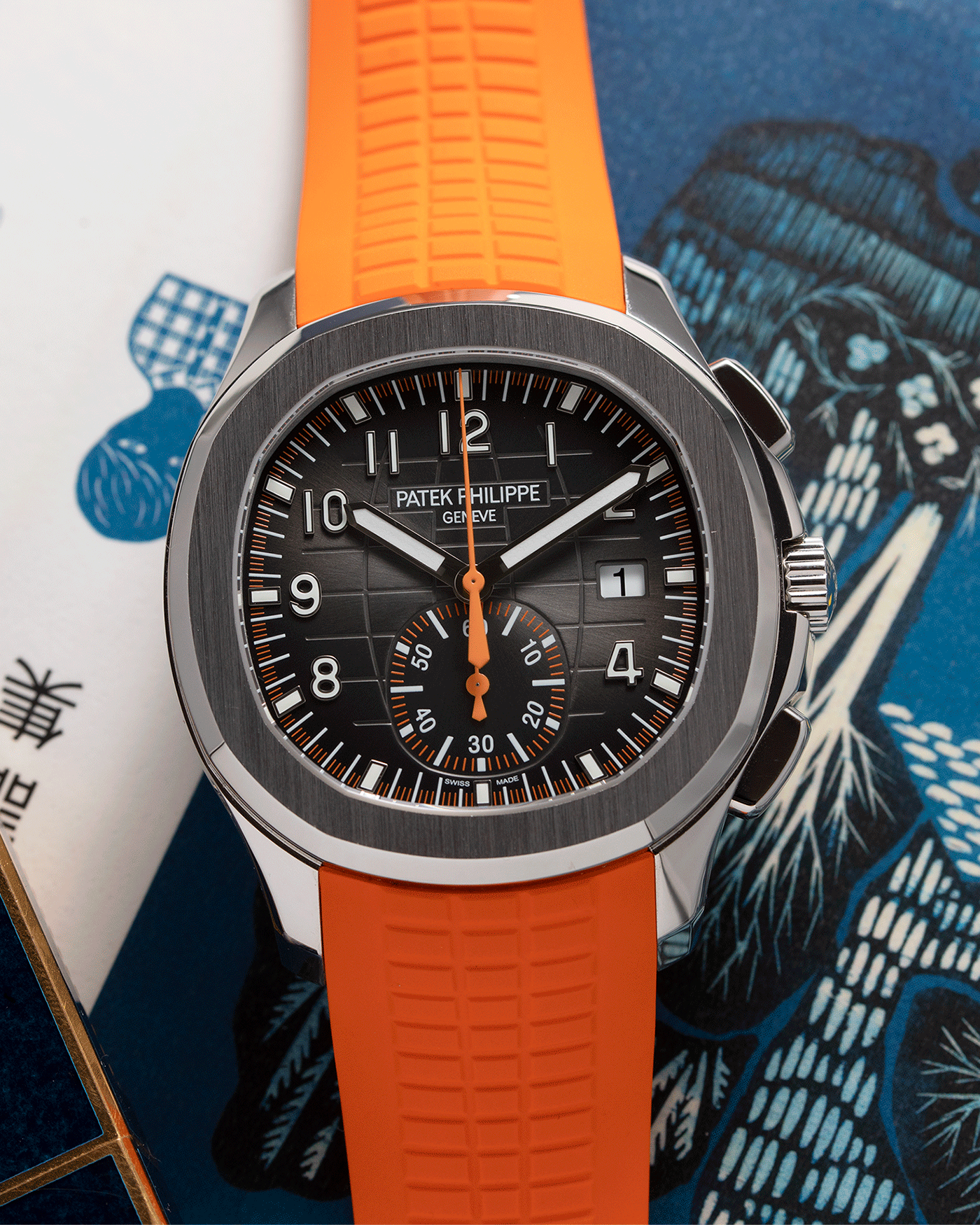 Brand: Patek Philippe Year: 2019 Model: Aquanaut Reference Number: 59689A Material: Stainless Steel Movement: Self Winding Patek Philippe Caliber CH 28-250 C Case Diameter: 42mm Strap: Patek Philippe Aquanaut Orange Rubber Strap and Two Additional Uncut Black and Orange Rubber Straps