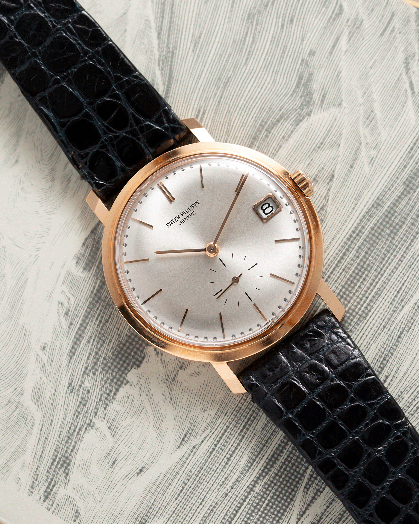 Brand: Patek Philippe Year: 1970’s Model: Calatrava Reference: 3445 Material: 18k Rose Gold Movement: Patek Philippe Self-Winding Cal. 27-460 Case Diameter: 35mm Lug Width: 18mm Strap: Vintage Patek Philippe Black Alligator Strap with 18k Rose Gold Tang Buckle