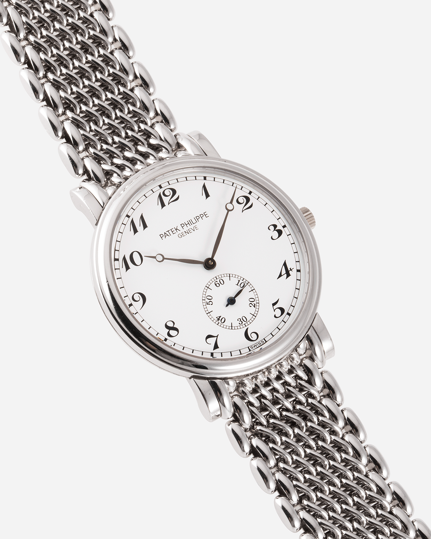 Brand: Patek Philippe Year: 1990’s Model: Calatrava Reference: 5022G Material: 18k White Gold Movement: Patek Philippe Cal. 215 Case Diameter: 33.4mm Lug Width: 18mm Strap: Patek Philippe 18k White Gold Bracelet