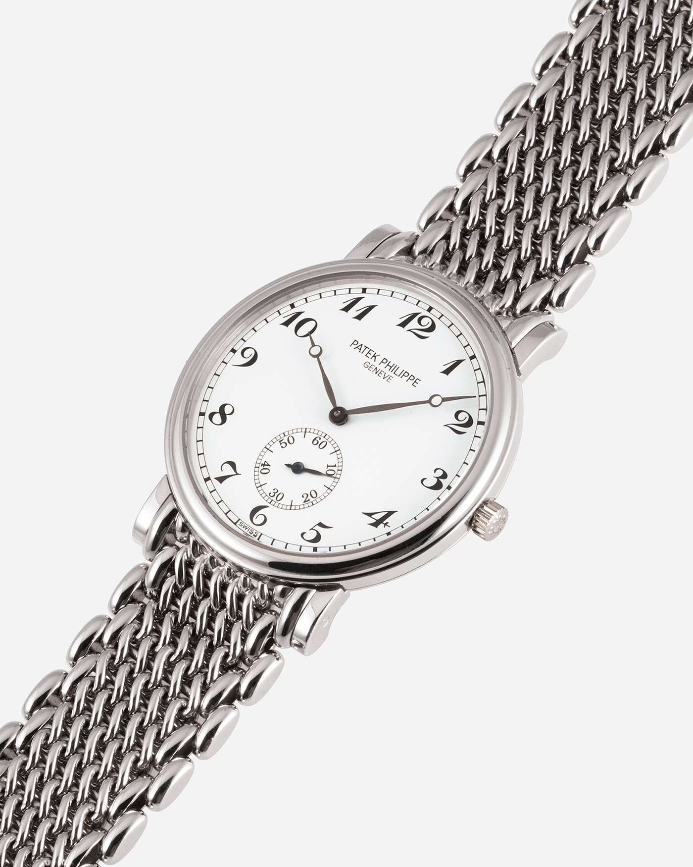 Brand: Patek Philippe Year: 1990’s Model: Calatrava Reference: 5022G Material: 18k White Gold Movement: Patek Philippe Cal. 215 Case Diameter: 33.4mm Lug Width: 18mm Strap: Patek Philippe 18k White Gold Bracelet