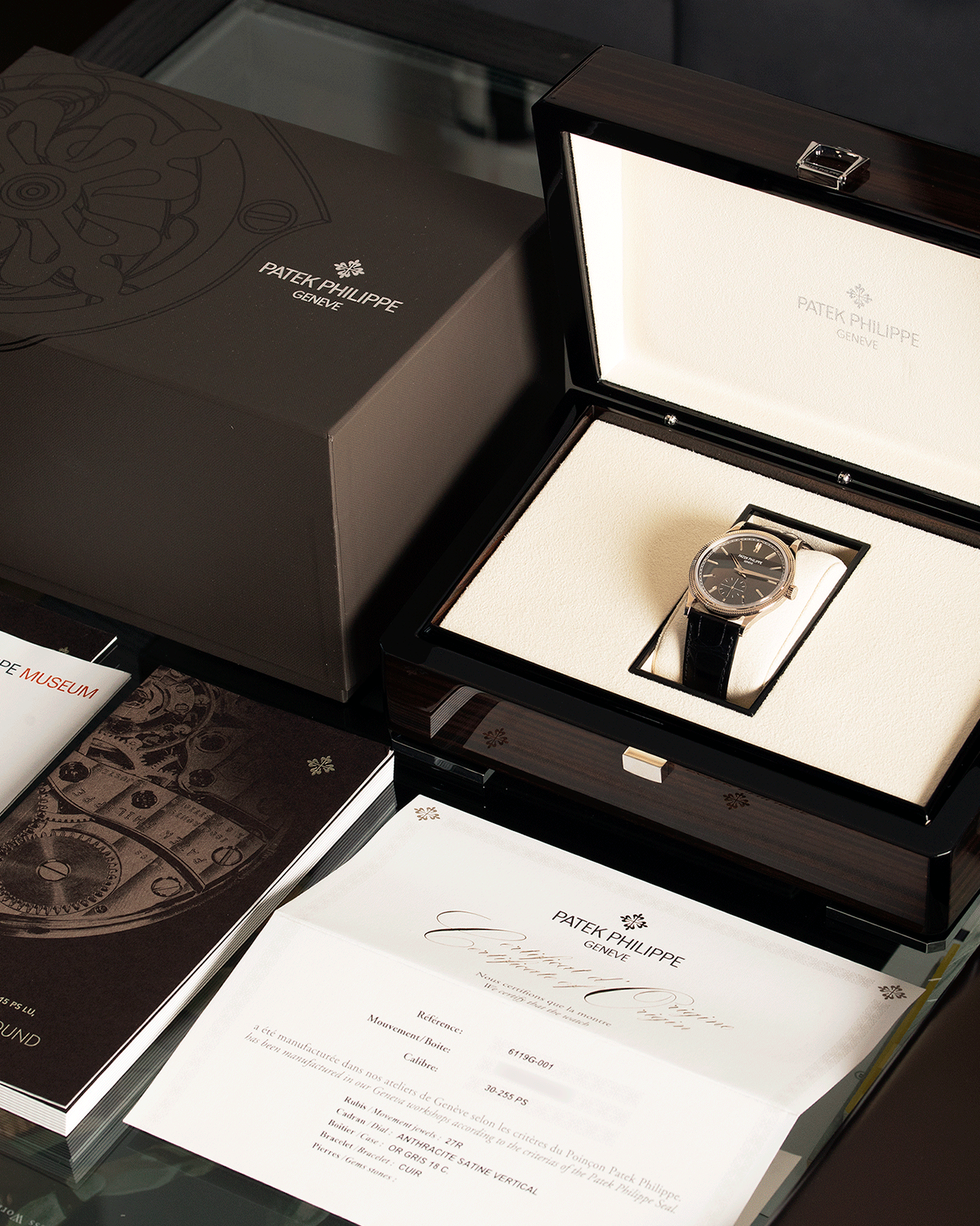 Brand: Patek Philippe Year: 2021 Model: Calatrava Reference: 6119G Material: White Gold Movement: Patek Philippe Cal. 30-255 Case Diameter: 39mm Strap: Patek Philippe Black Alligator Strap with 18k White Gold Patek Philippe Tang Buckle