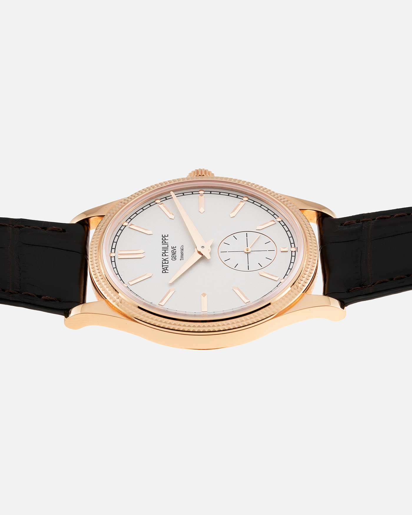 Brand: Patek Philippe Year: 2022 Model: Calatrava Reference: 6119R Material: 18-carat Rose Gold Movement: Patek Philippe Cal. 30-255, Manual-Wind Case Diameter: 39mm x 8.08mm Strap: Patek Philippe Chocolate Brown Alligator Leather with Signed 18-carat Rose Gold Tang Buckle