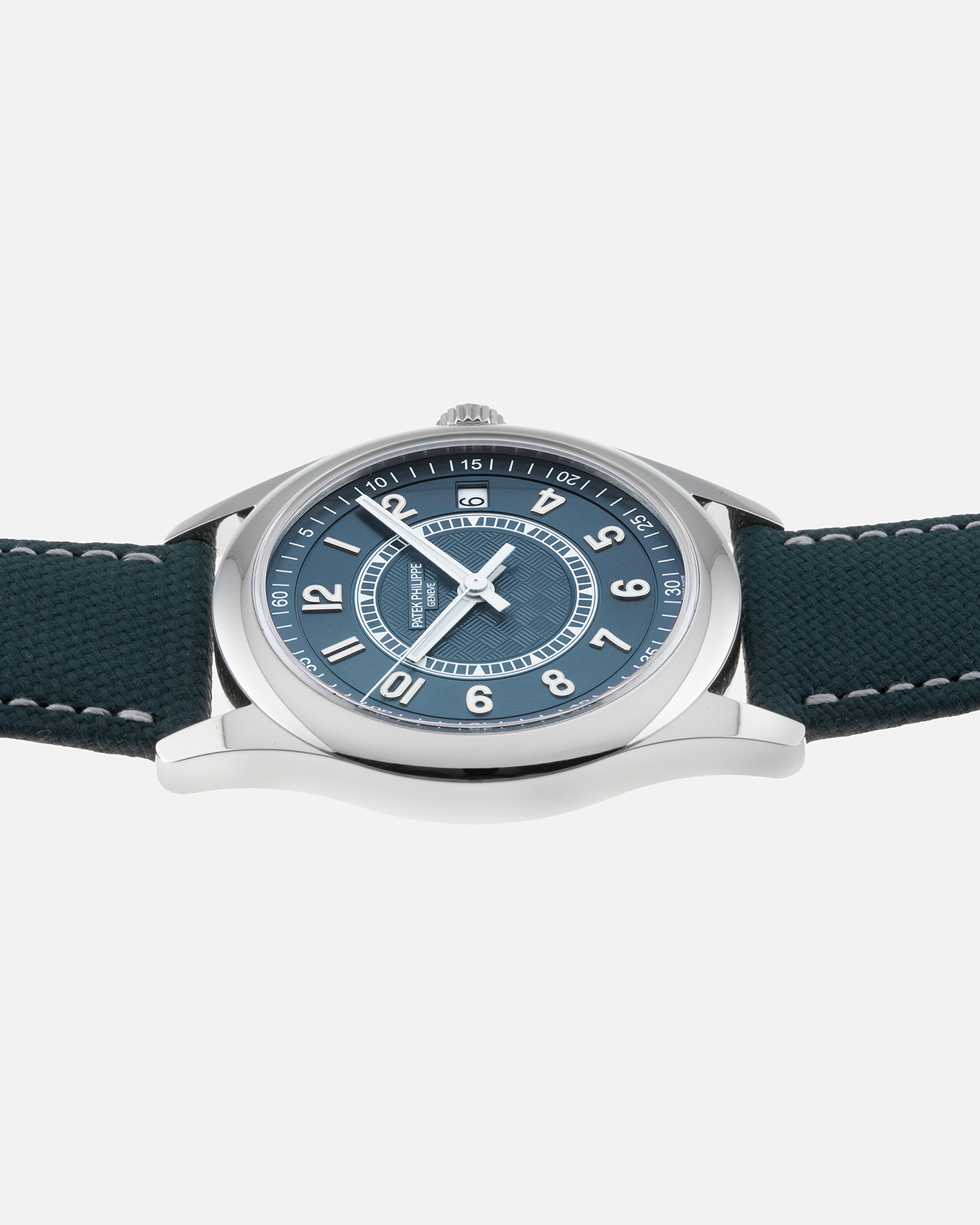 Brand: Patek Philippe Year: 2019 Model: Ref. 6007A Calatrava Limited Edition Material: Stainless Steel Movement: Cal. 324 SC (Seconde Central), Self–Winding Case Diameter: 40mm Bracelet/Strap: Patek Philippe Grey-Blue Calfskin Leather Strap with Embossed Fabric Pattern, and Signed Tang Buckle