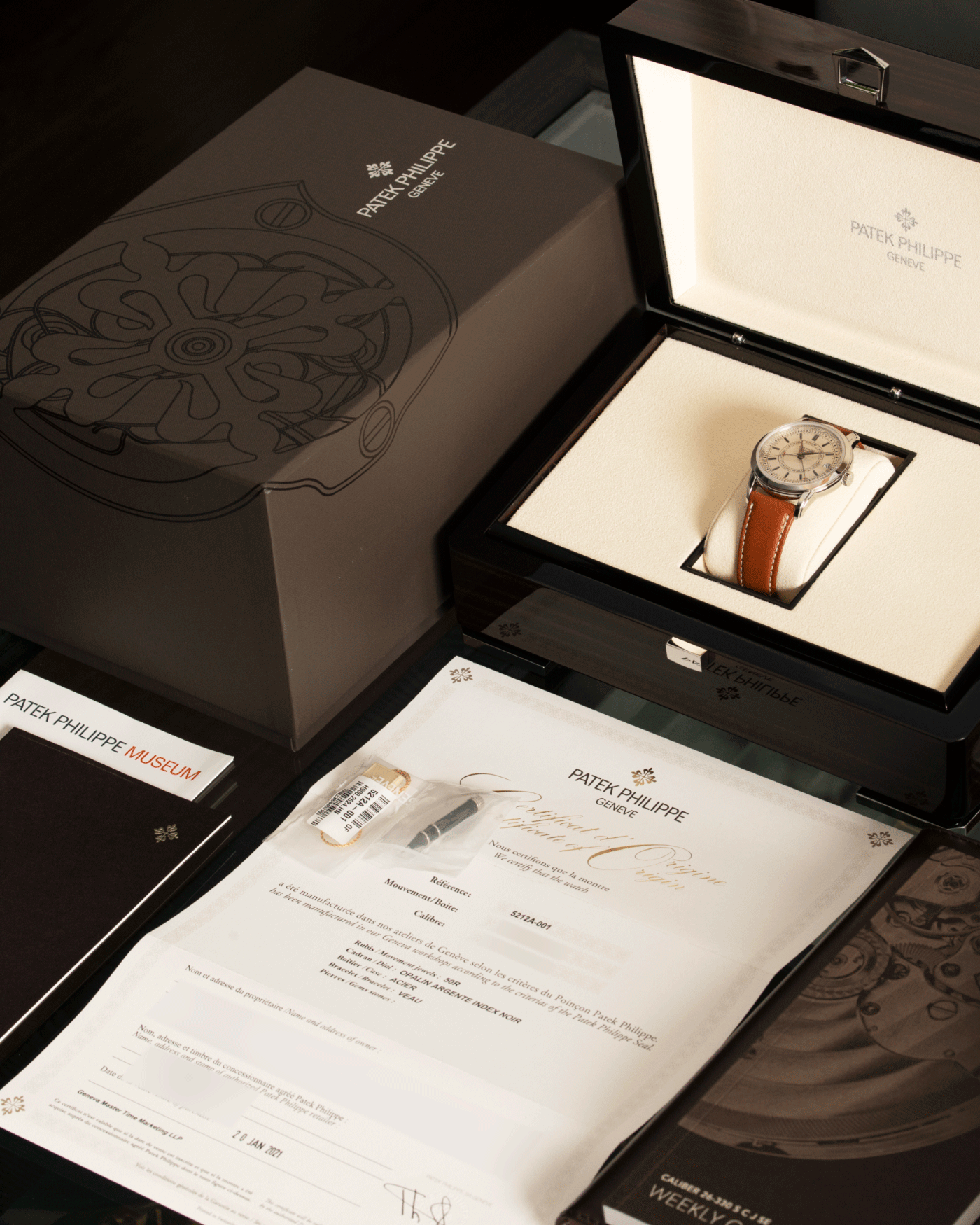 Brand: Patek Philippe Year: 2019 Model: Calatrava Weekly Calendar Reference Number: 5212A Material: Stainless Steel Movement: In-House Caliber 26 330 S C J SE Case Diameter: 40mm Bracelet: Patek Philippe Chestnut Brown Calfskin and Stainless Steel Tang Buckle