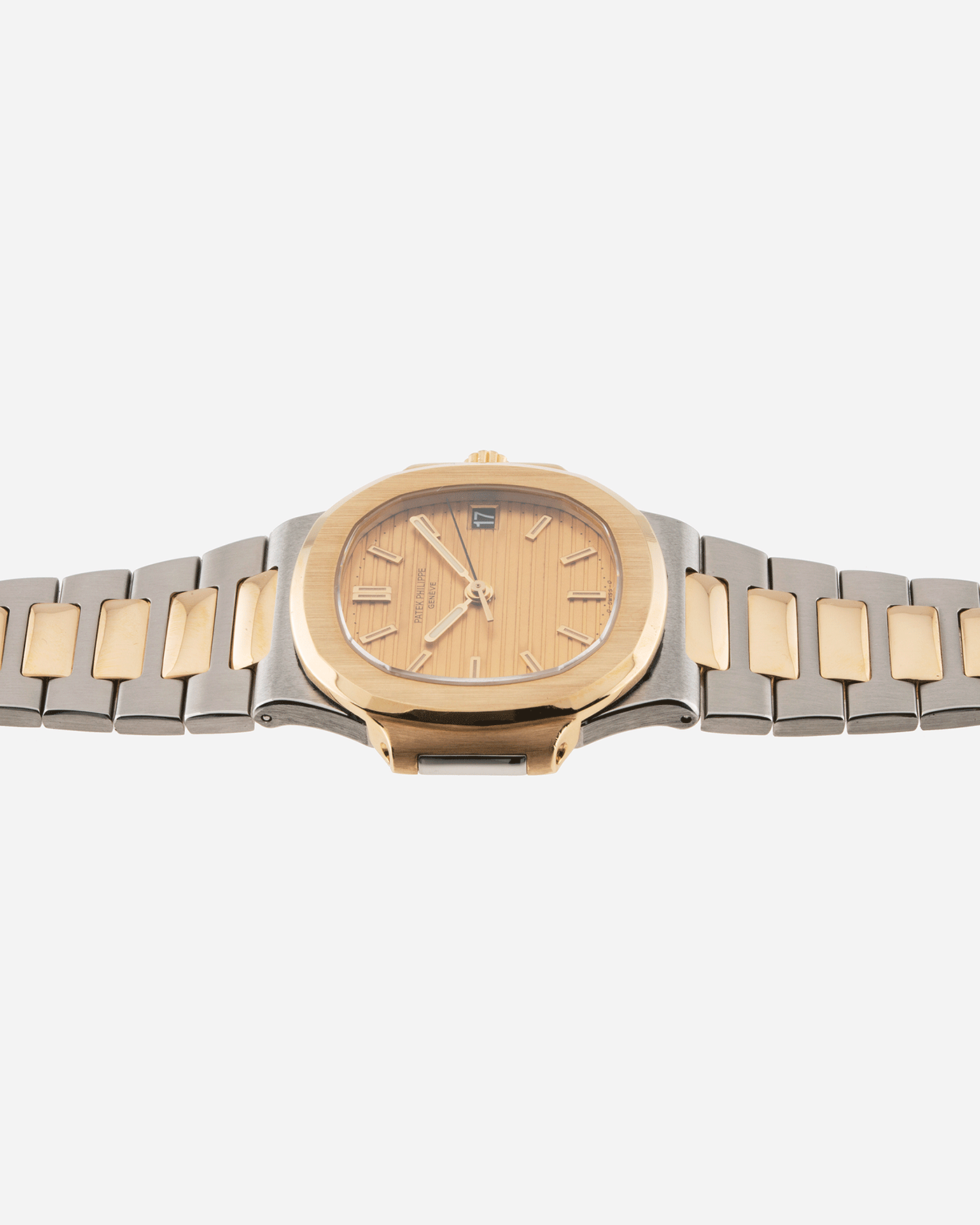 Brand: Patek Philippe Year: 1980’s Model: Nautilus Reference Number: 3800 Material: Stainless Steel and 18k Yellow Gold Movement: Calibre 335 SC Case Diameter: 38mm Bracelet: Patek Philippe Integrated Stainless Steel and 18k Yellow Gold Bracelet