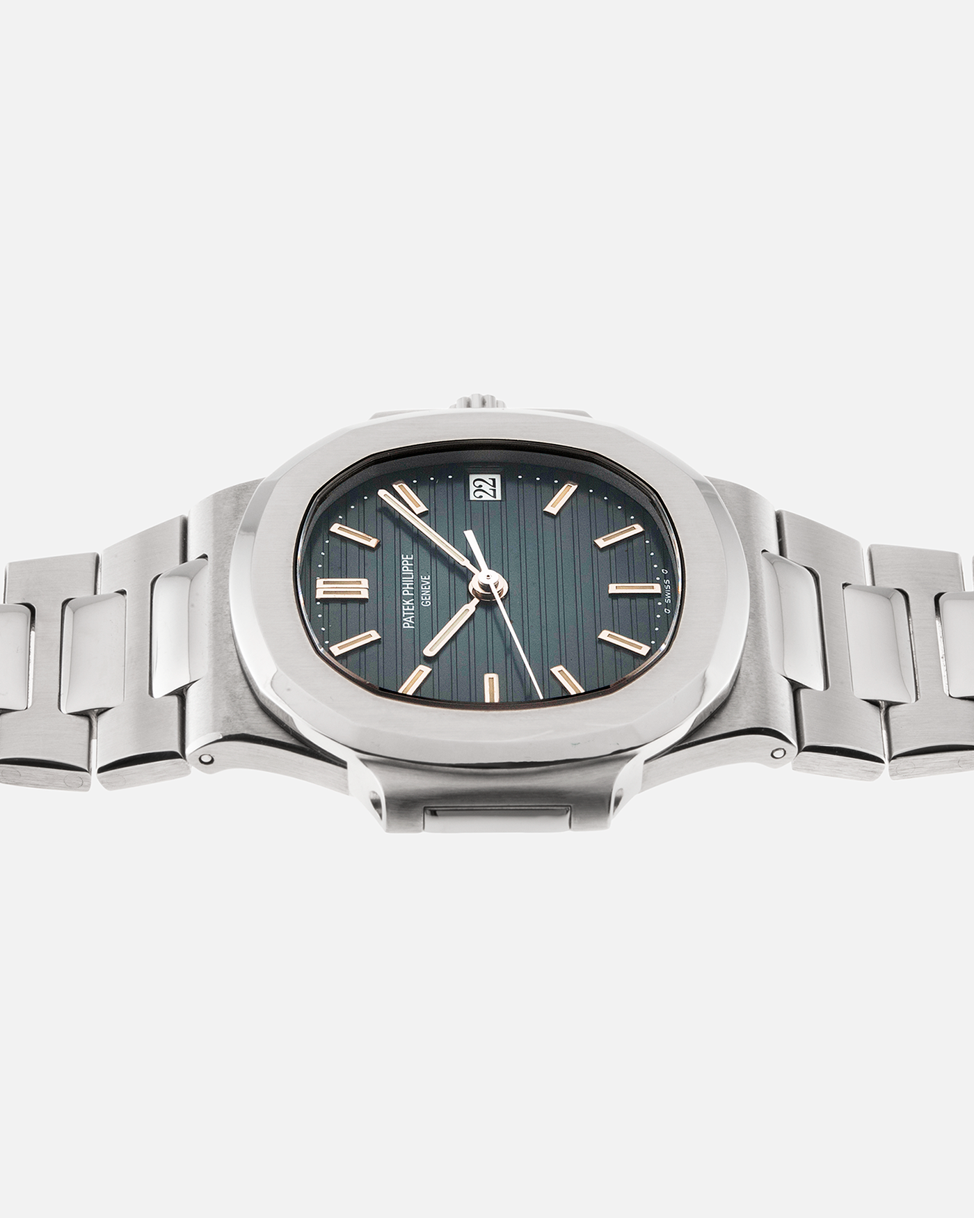 Brand: Patek Philippe Year: 1993 Model: Nautilus Reference Number: 3800 Material: Stainless Steel Movement: Calibre 335 SC Case Diameter: 38mm Bracelet: Patek Philippe Integrated Stainless Steel Bracelet