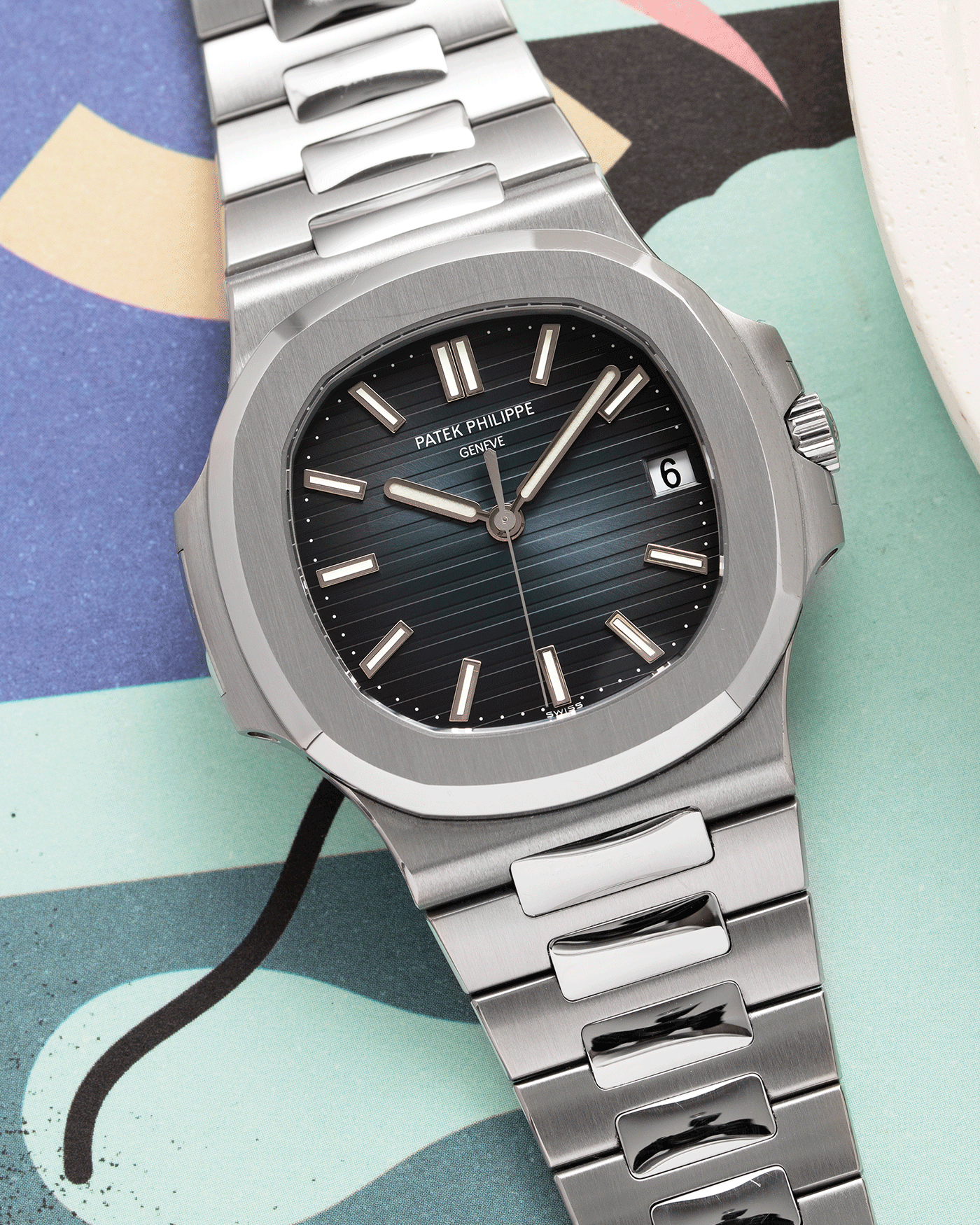 Brand: Patek Philippe Year: 2014 Model: Nautilus Reference Number: 5711A Material: Stainless Steel Movement: Calibre 324SC Case Diameter: 40mm Bracelet: Patek Philippe Integrated Stainless Steel Bracelet