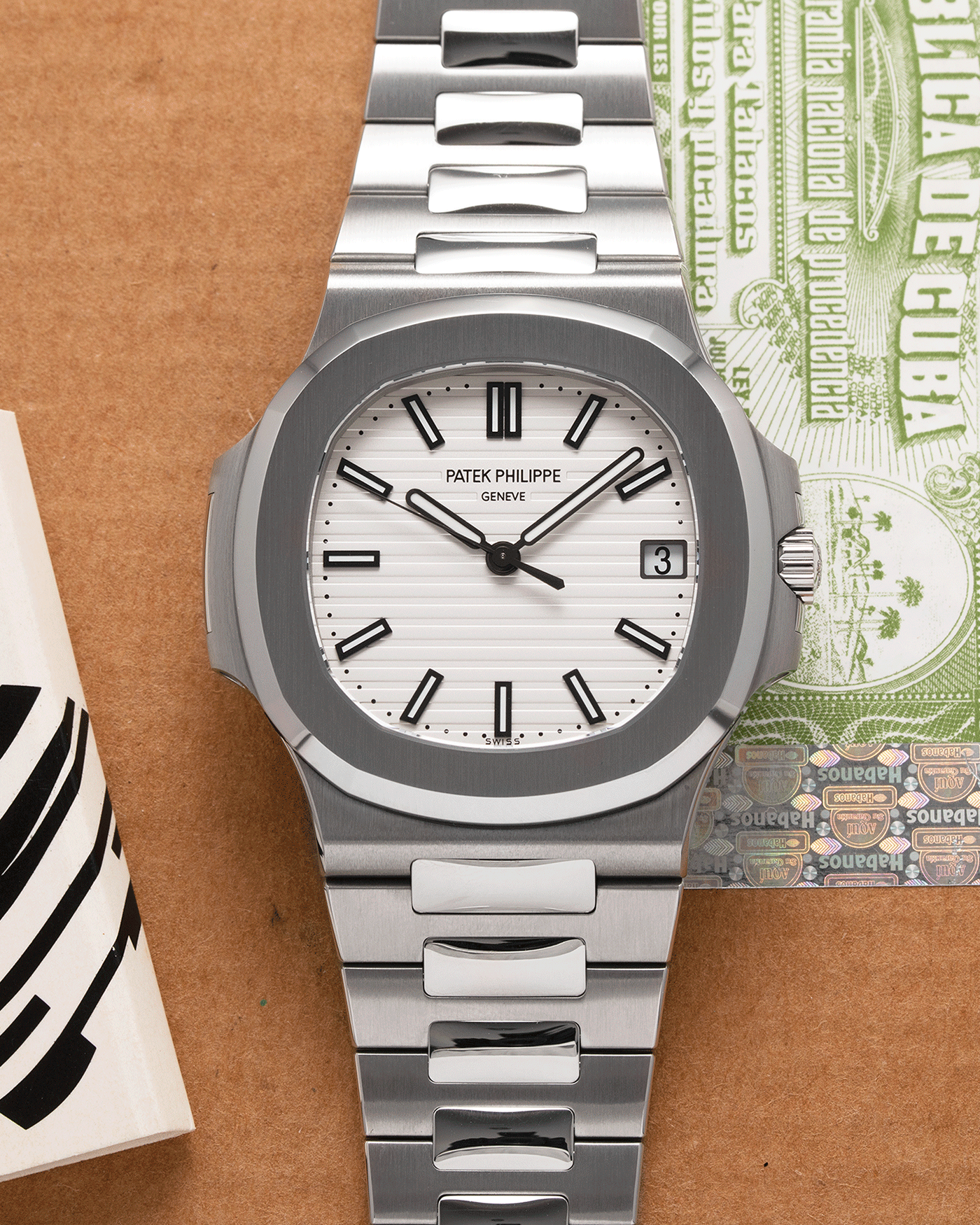 Brand: Patek Philippe Year: 2018 Model: Nautilus Reference Number: 5711A Material: Stainless Steel Movement: Calibre 324SC Case Diameter: 40mm Bracelet: Patek Philippe Integrated Stainless Steel Bracelet