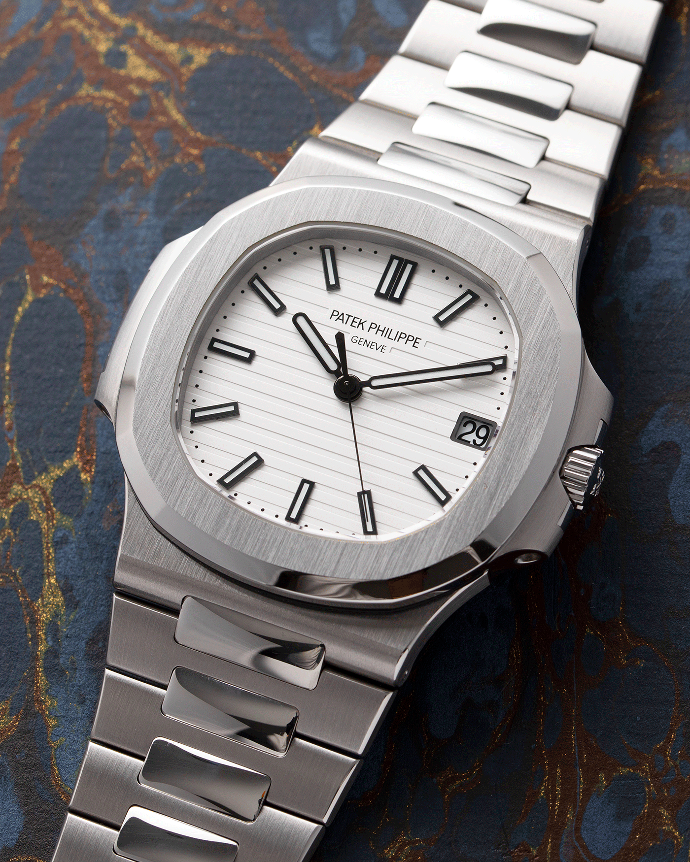 Brand: Patek Philippe Year: 2013 Model: Nautilus Reference Number: 5711A Material: Stainless Steel Movement: Calibre 324SC Case Diameter: 40mm Bracelet: Patek Philippe Integrated Stainless Steel Bracelet