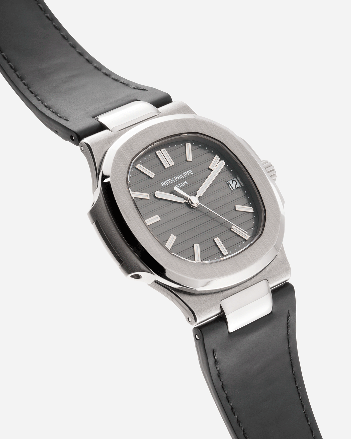 Brand: Patek Philippe Year: 2008 Model: Nautilus Reference Number: 5711G Material:18k White Gold Movement: Calibre 324SC Case Diameter: 40mm Bracelet: Patek Philippe Grey Leather Strap with 18k White Gold Nautilus Deployant