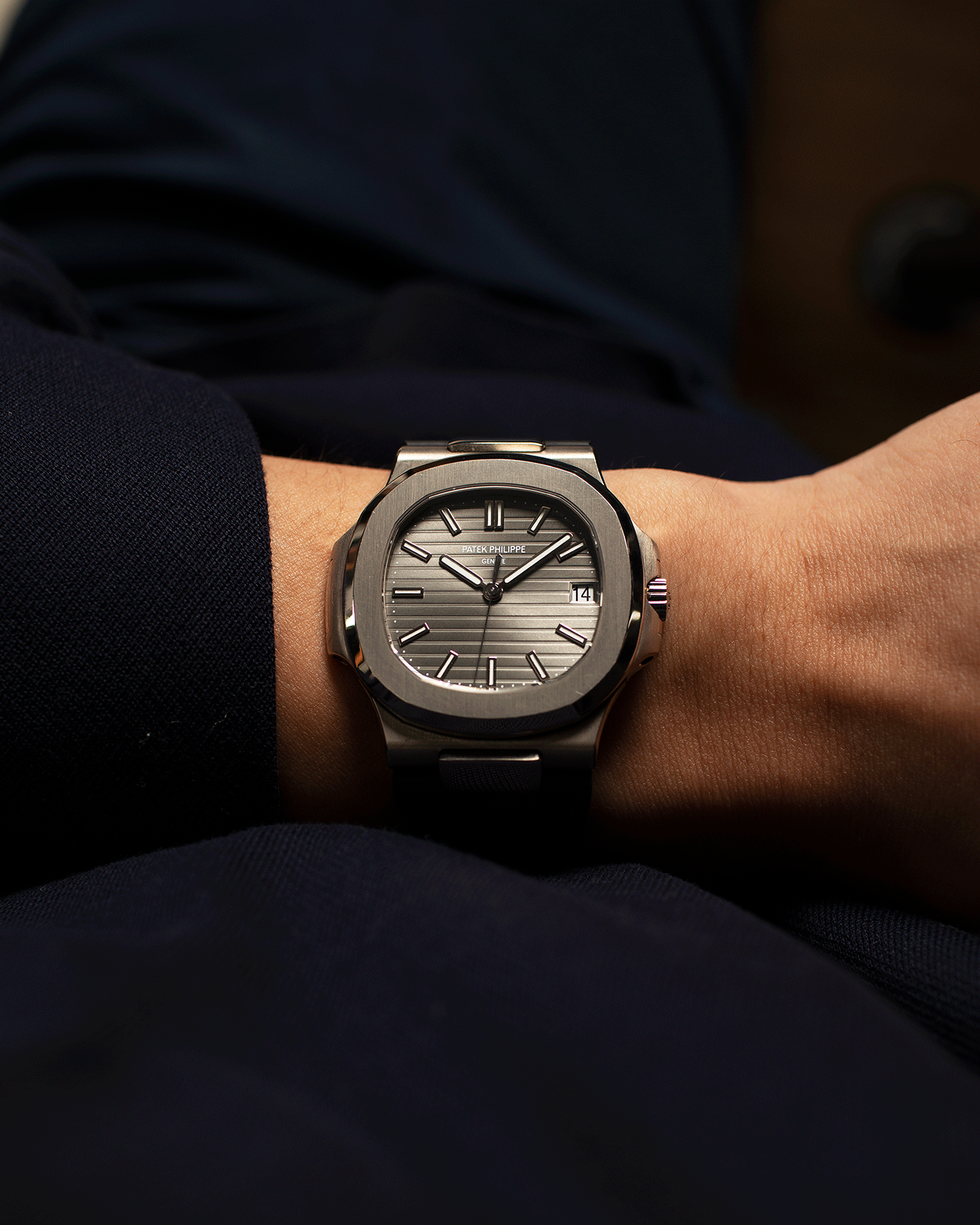 Brand: Patek Philippe Year: 2008 Model: Nautilus Reference Number: 5711G Material:18k White Gold Movement: Calibre 324SC Case Diameter: 40mm Bracelet: Patek Philippe Grey Leather Strap with 18k White Gold Nautilus Deployant