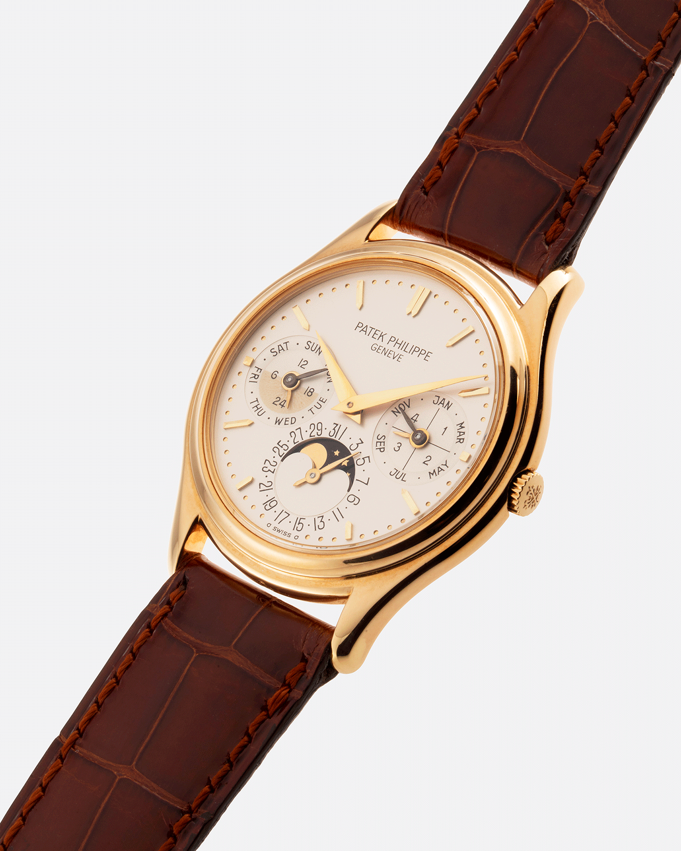 Brand: Patek Philippe Year: 1990’s Model: Perpetual Calendar Reference Number: 3940J Material: 18k Yellow Gold Movement: Cal 240Q Case Diameter: 36mm Bracelet: A Collected Man Chestnut Brown Textured Calf Strap and Patek Philippe Chestnut Brown Alligator Strap with 18k Yellow Gold Patek Philippe Tang Buckle