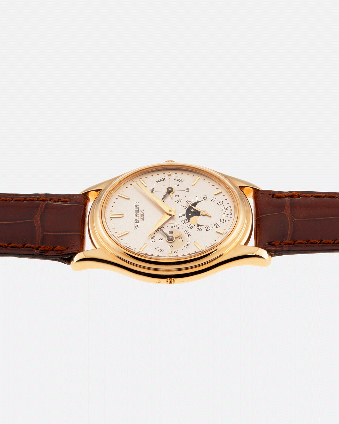 Brand: Patek Philippe Year: 1990’s Model: Perpetual Calendar Reference Number: 3940J Material: 18k Yellow Gold Movement: Cal 240Q Case Diameter: 36mm Bracelet: A Collected Man Chestnut Brown Textured Calf Strap and Patek Philippe Chestnut Brown Alligator Strap with 18k Yellow Gold Patek Philippe Tang Buckle