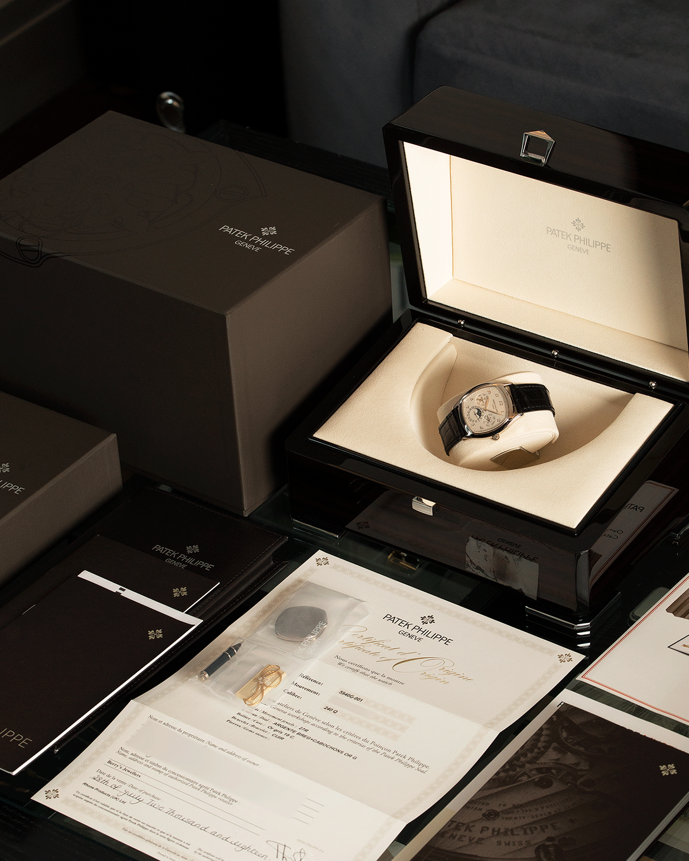 Brand: Patek Philippe Year: 2018 Model: Perpetual Calendar Reference Number: 5940G Material: White Gold Movement: Cal 240Q Case Diameter: 37mm Bracelet: Patek Philippe Black Alligator Strap with White Gold Tang Buckle