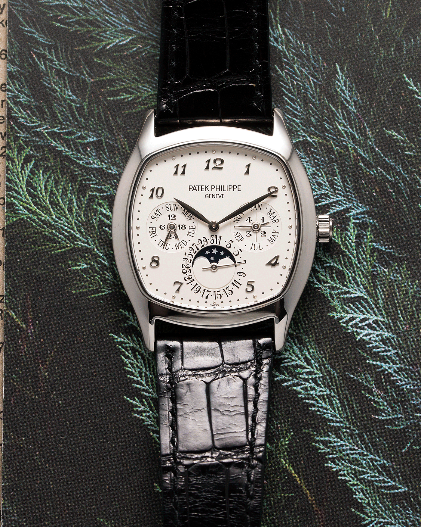 Brand: Patek Philippe Year: 2018 Model: Perpetual Calendar Reference Number: 5940G Material: White Gold Movement: Cal 240Q Case Diameter: 37mm Bracelet: Patek Philippe Black Alligator Strap with White Gold Tang Buckle