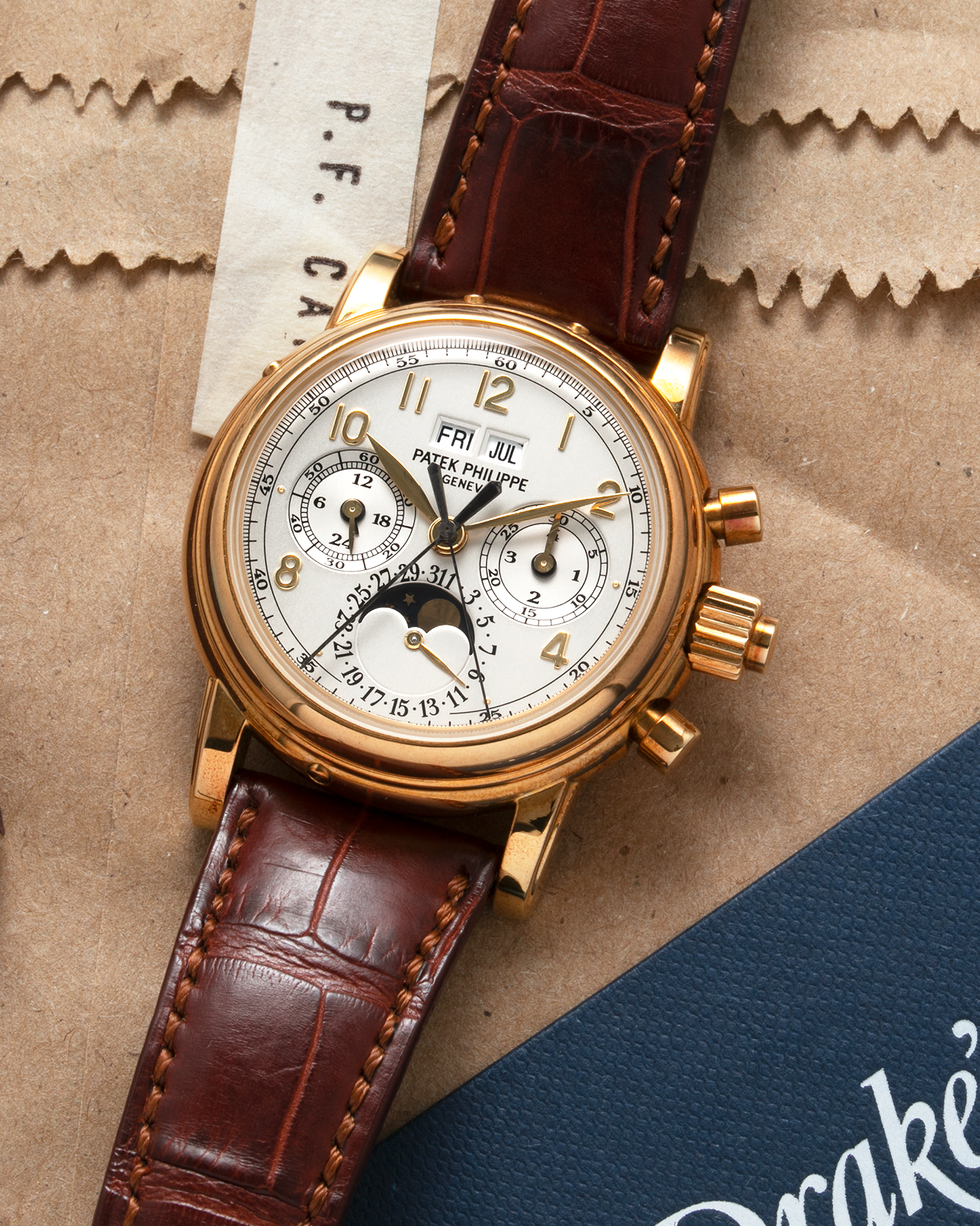 Brand: Patek Philippe  Year: Early 2000’s Model: Ref. 5004J Perpetual Calendar Split Seconds Chronograph Material: 18-carat Yellow Gold Movement: In-house Patek Philippe Cal. CHR27-70Q, Manual-Winding  Case Diameter: 36mm Bracelet/Strap: Patek Philippe Brown Alligator Strap with 18-carat Yellow Gold Signed Deployant Clasp