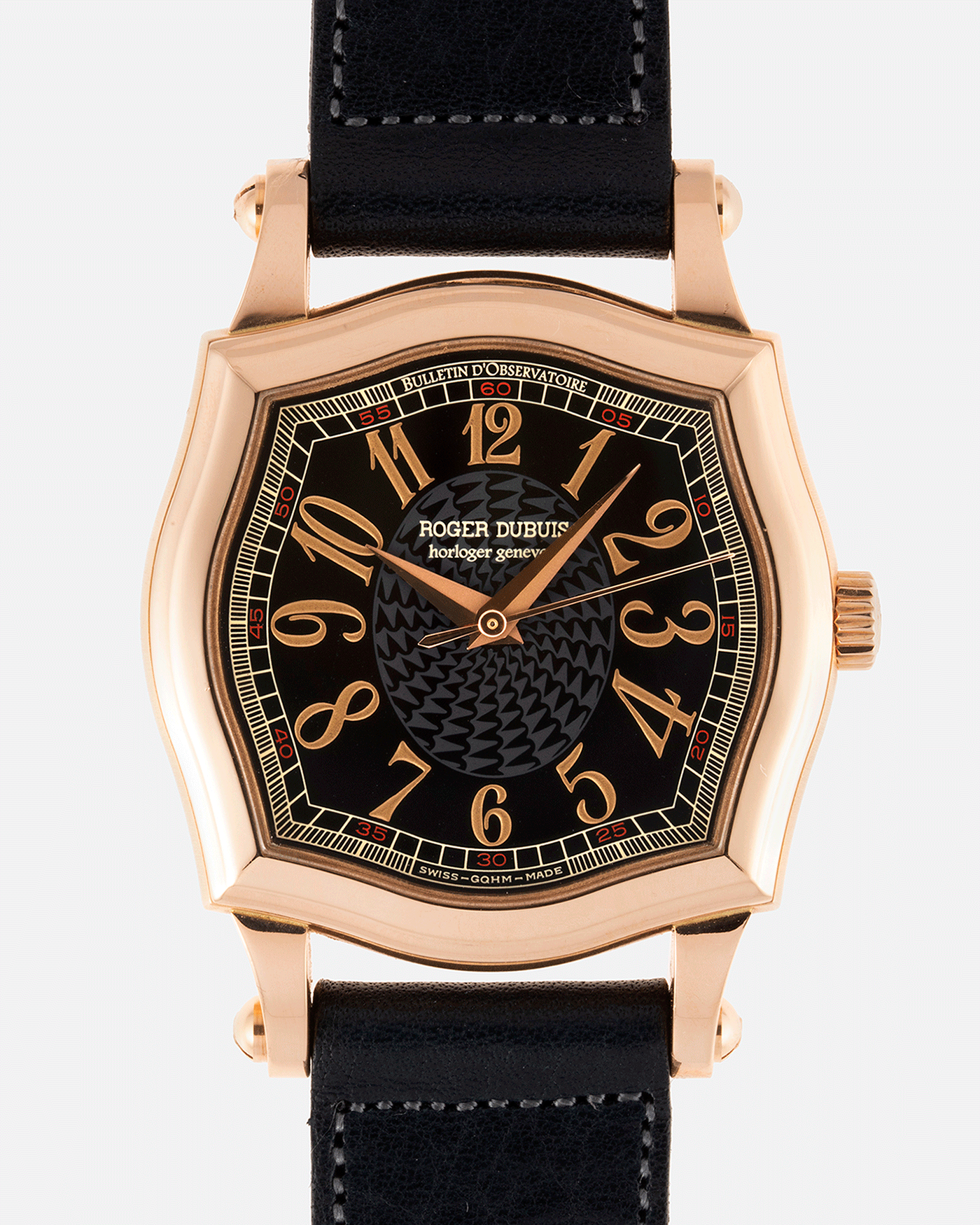 Brand: Roger Dubuis Year: 1998 Model: Sympathie 34 Material: 18k Rose Gold Movement: Cal RD 57 Case Diameter: 34mm Strap: Navy Blue Accurate Form Japanese Calf Leather and 18k Rose Gold Roger Dubuis Tang Buckle