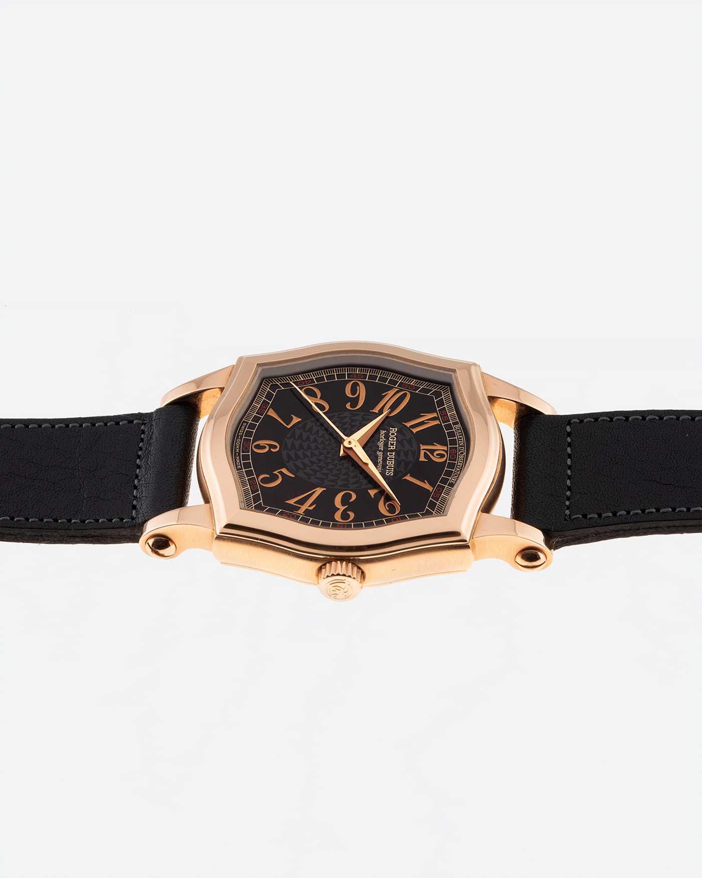 Brand: Roger Dubuis Year: 1998 Model: Sympathie 34 Material: 18k Rose Gold Movement: Cal RD 57 Case Diameter: 34mm Strap: Navy Blue Accurate Form Japanese Calf Leather and 18k Rose Gold Roger Dubuis Tang Buckle