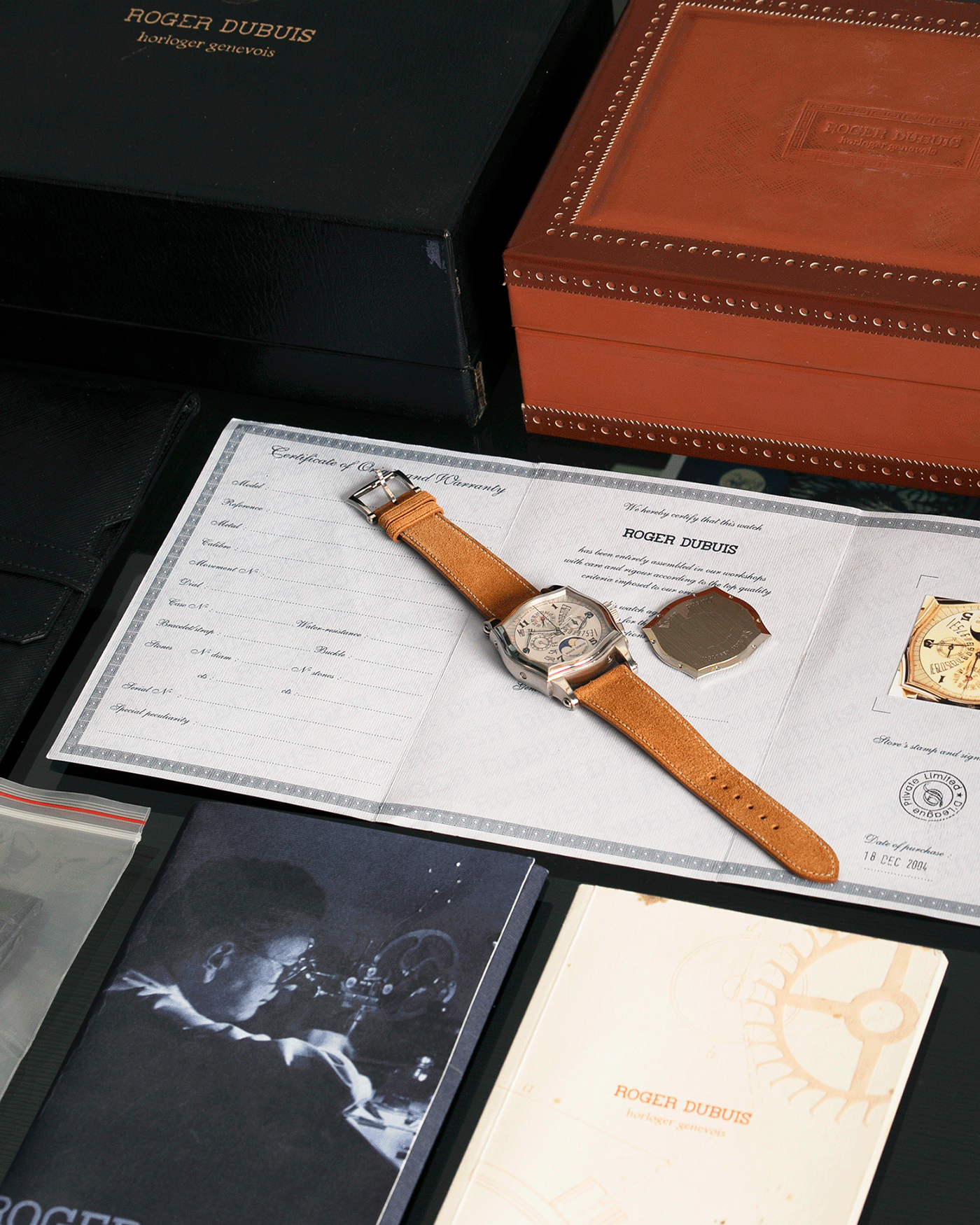 Brand: Roger Dubuis Year: 2000’s Model: Sympathie 37 Perpetual Chronograph Material: 18k White Gold Movement: Cal RD 5637 Case Diameter: 37mm Strap: Nostime Sand Tan Suede Calf with 18k White Gold Roger Dubuis Tang Buckle