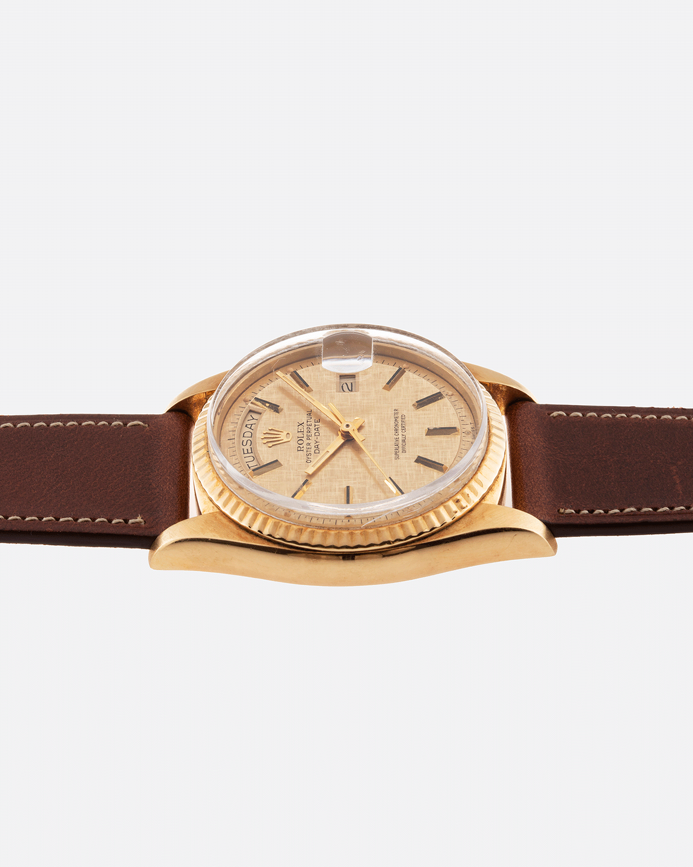 Brand: Rolex Year: 1978 Model: Day Date Reference Number: 1803 Serial Number: 5089385 Material: 18k Yellow Gold Movement: Cal. 1555 Case Diameter: 36mm Lug Width: 20mm Bracelet/Strap: Nostime Tobacco Brown Horween Shell Cordovan