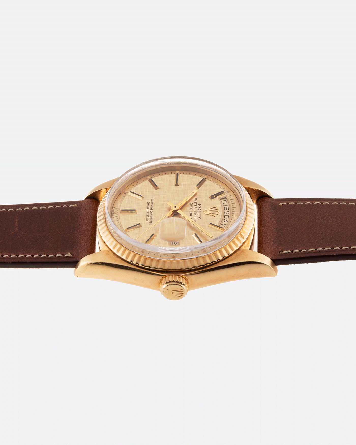 Brand: Rolex Year: 1978 Model: Day Date Reference Number: 1803 Serial Number: 5089385 Material: 18k Yellow Gold Movement: Cal. 1555 Case Diameter: 36mm Lug Width: 20mm Bracelet/Strap: Nostime Tobacco Brown Horween Shell Cordovan
