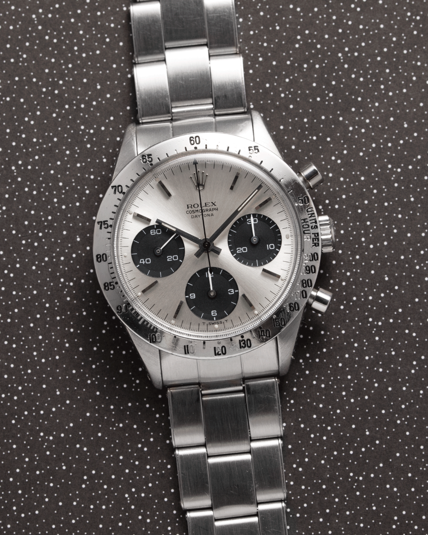 Brand: Rolex Year: 1966 Model: Cosmograph Daytona Reference Number: 6239 Serial Number: 1,4XX,XXX Material: Stainless Steel Movement: Valjoux 72 Case Diameter: 36.5mm Strap: Rolex 7205 Folded Oyster Bracelet with 57 Endlinks, Stamped 4.66