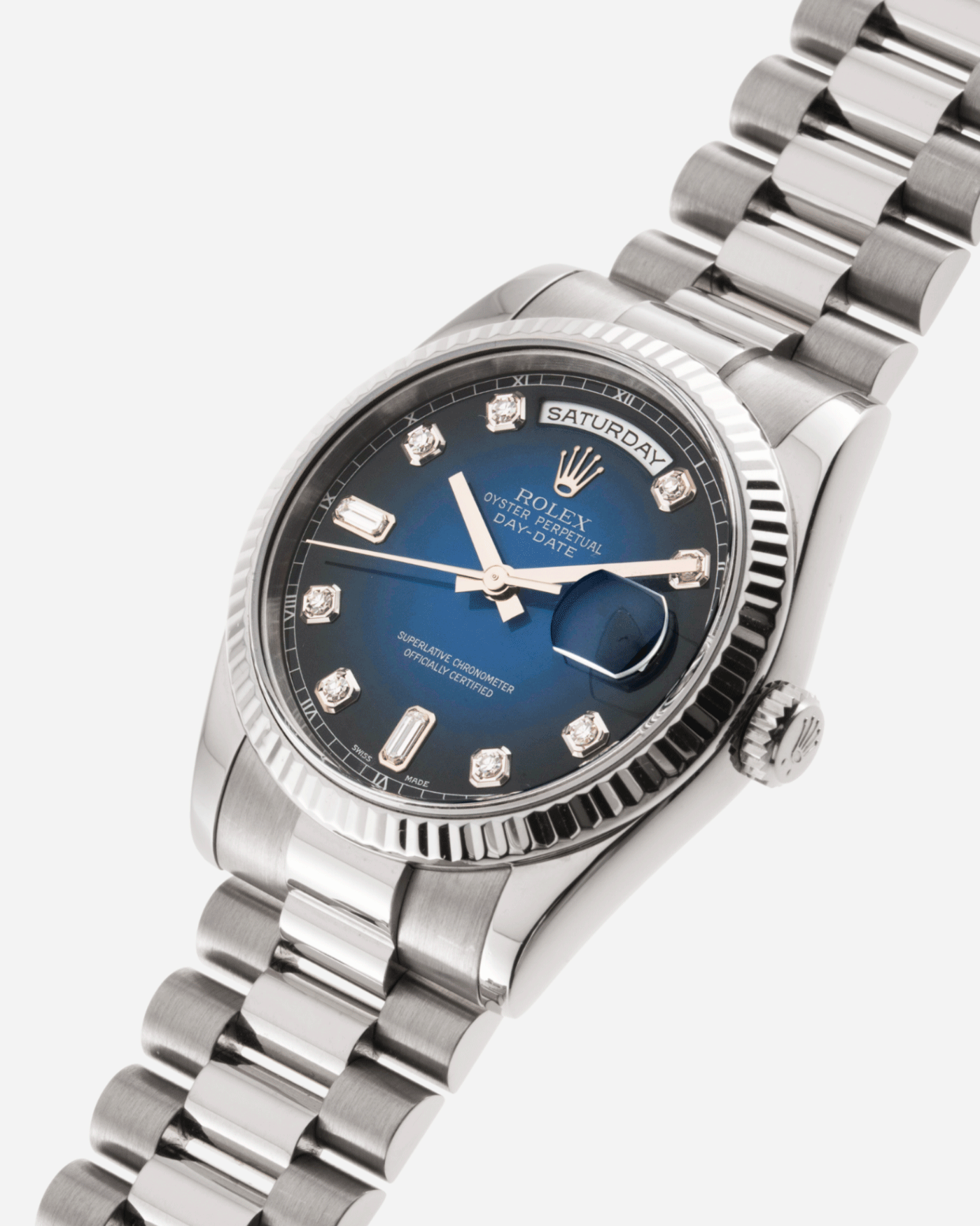 Brand: Rolex Year: 2000 Model: Day Date Reference Number: 118239 Serial Number: P Serial Material: 18k White Gold Movement: Cal. 3155 Case Diameter: 36mm Lug Width: 20mm Bracelet/Strap: Rolex 18k White Gold 83859 President Bracelet