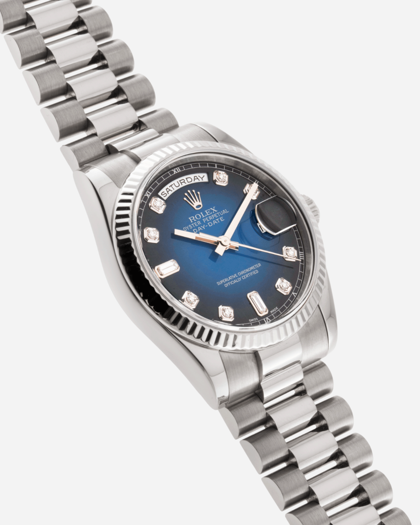 Brand: Rolex Year: 2000 Model: Day Date Reference Number: 118239 Serial Number: P Serial Material: 18k White Gold Movement: Cal. 3155 Case Diameter: 36mm Lug Width: 20mm Bracelet/Strap: Rolex 18k White Gold 83859 President Bracelet