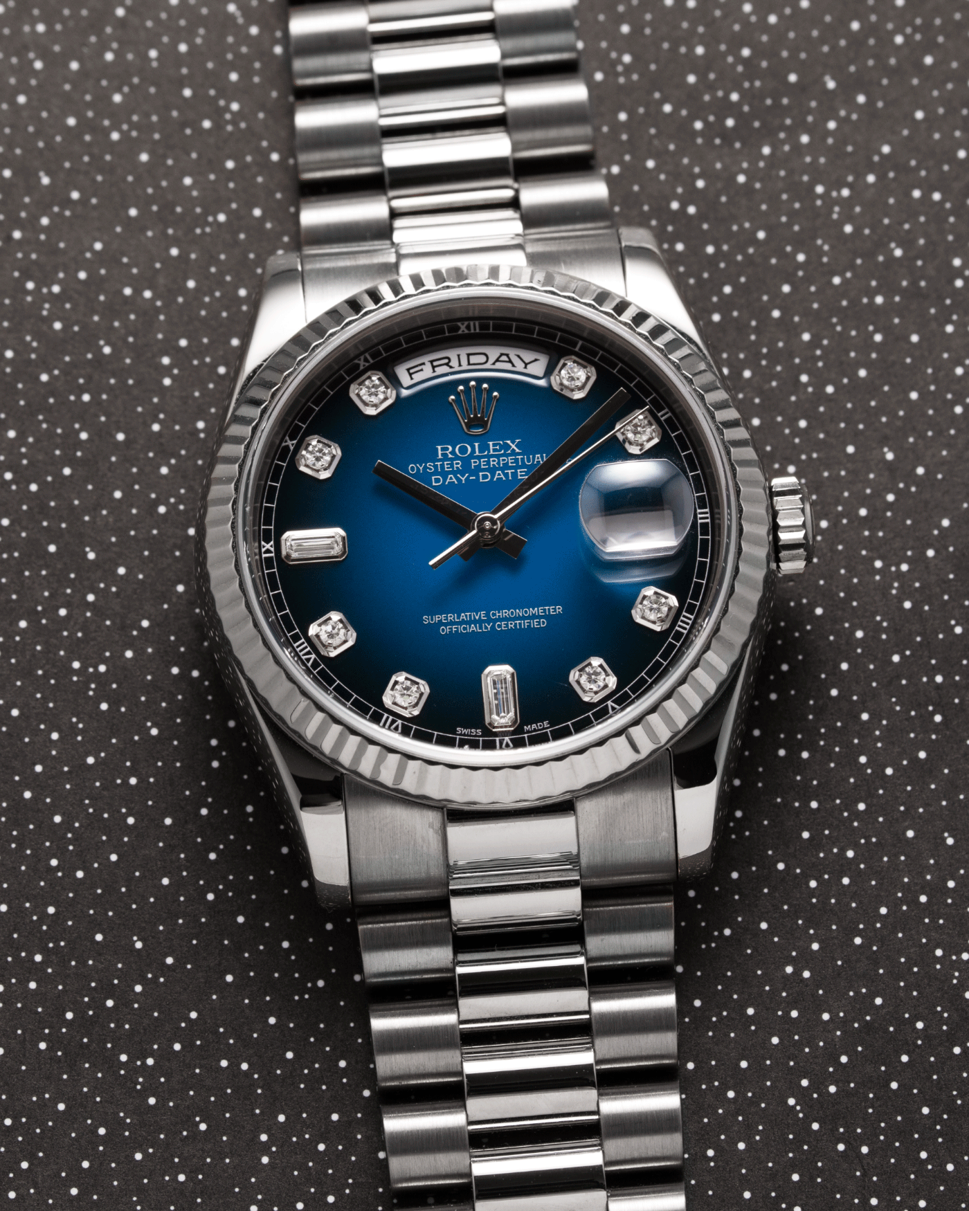 Brand: Rolex Year: 2000 Model: Day Date Reference Number: 118239 Serial Number: P Serial Material: 18k White Gold Movement: Cal. 3155 Case Diameter: 36mm Lug Width: 20mm Bracelet/Strap: Rolex 18k White Gold 83859 President Bracelet