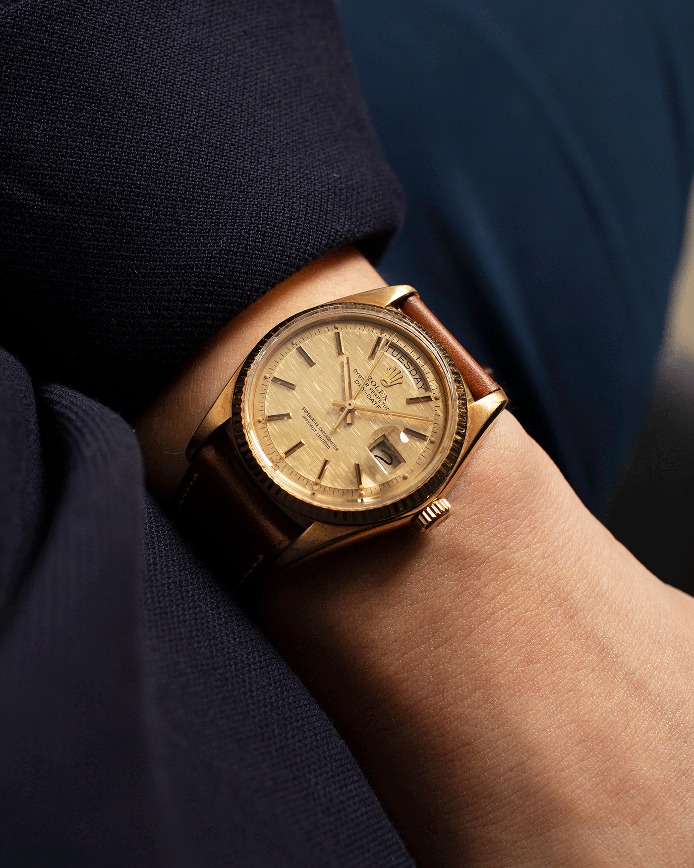 Brand: Rolex Year: 1978 Model: Day Date Reference Number: 1803 Serial Number: 5089385 Material: 18k Yellow Gold Movement: Cal. 1555 Case Diameter: 36mm Lug Width: 20mm Bracelet/Strap: Nostime Tobacco Brown Horween Shell Cordovan
