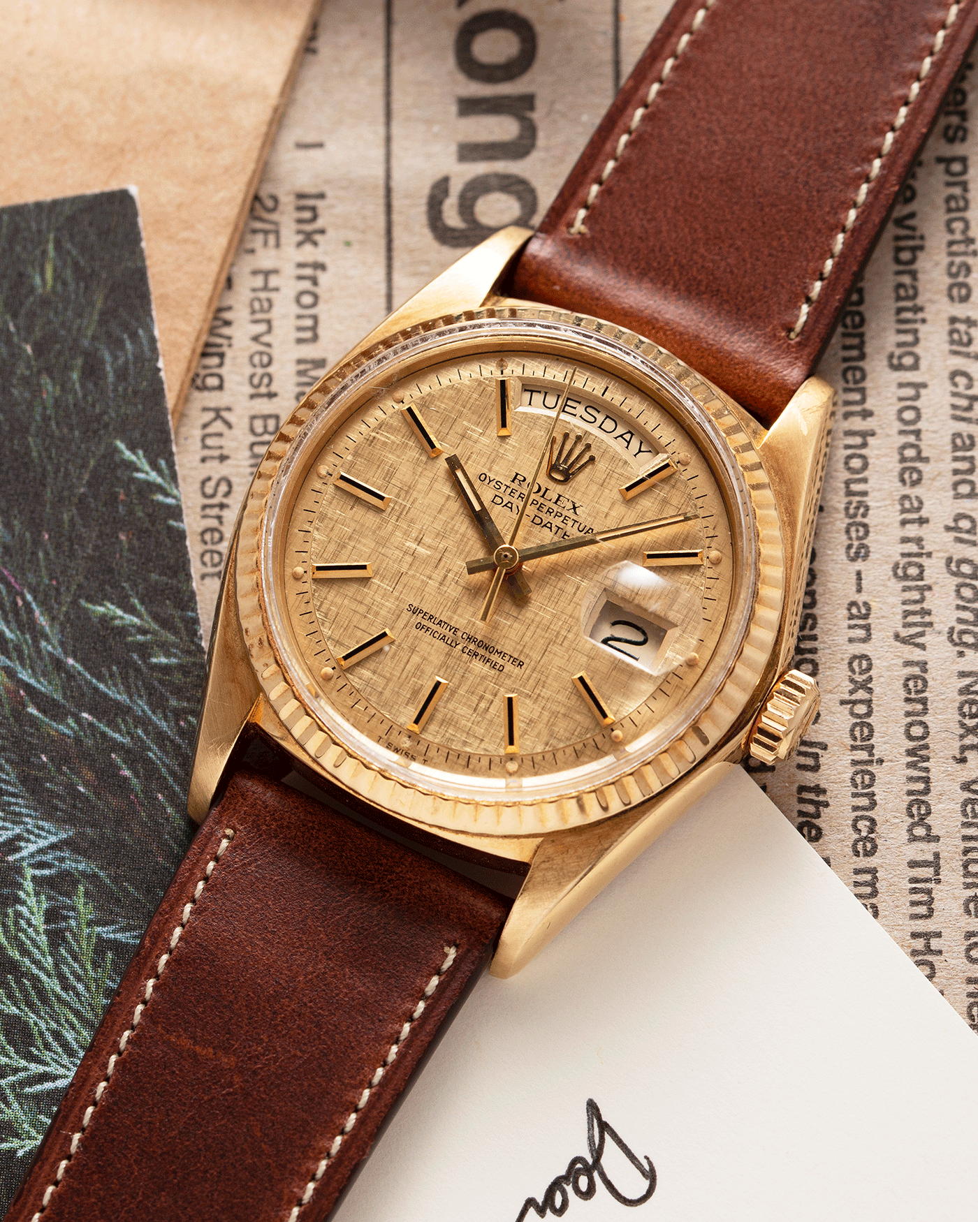 Brand: Rolex Year: 1978 Model: Day Date Reference Number: 1803 Serial Number: 5089385 Material: 18k Yellow Gold Movement: Cal. 1555 Case Diameter: 36mm Lug Width: 20mm Bracelet/Strap: Nostime Tobacco Brown Horween Shell Cordovan