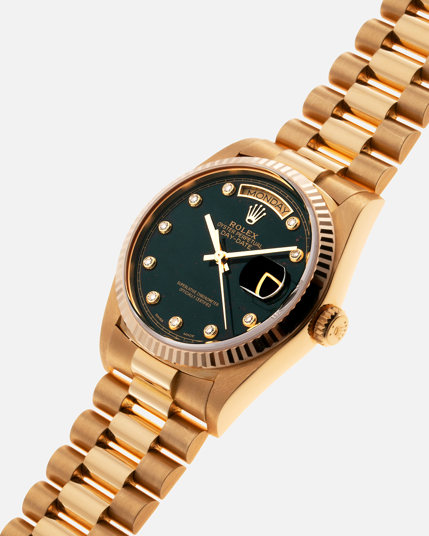 Brand: Rolex Year: 1987 Model: Day Date Reference Number: 18038 Serial: 9.8 Mil Material: 18k Yellow Gold Movement: Cal. 3055 Case Diameter: 36mm Lug Width: 20mm Bracelet/Strap: Rolex 838518k Solid Gold President Bracelet