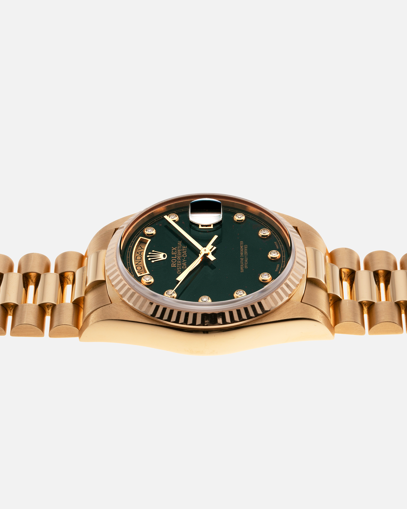 Brand: Rolex Year: 1987 Model: Day Date Reference Number: 18038 Serial: 9.8 Mil Material: 18k Yellow Gold Movement: Cal. 3055 Case Diameter: 36mm Lug Width: 20mm Bracelet/Strap: Rolex 838518k Solid Gold President Bracelet