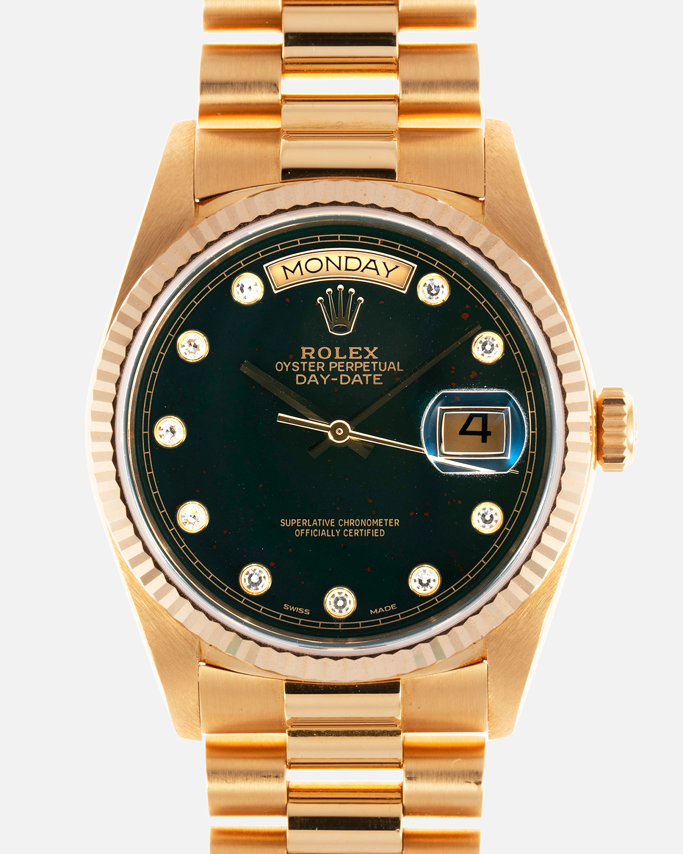 Brand: Rolex Year: 1987 Model: Day Date Reference Number: 18038 Serial: 9.8 Mil Material: 18k Yellow Gold Movement: Cal. 3055 Case Diameter: 36mm Lug Width: 20mm Bracelet/Strap: Rolex 838518k Solid Gold President Bracelet