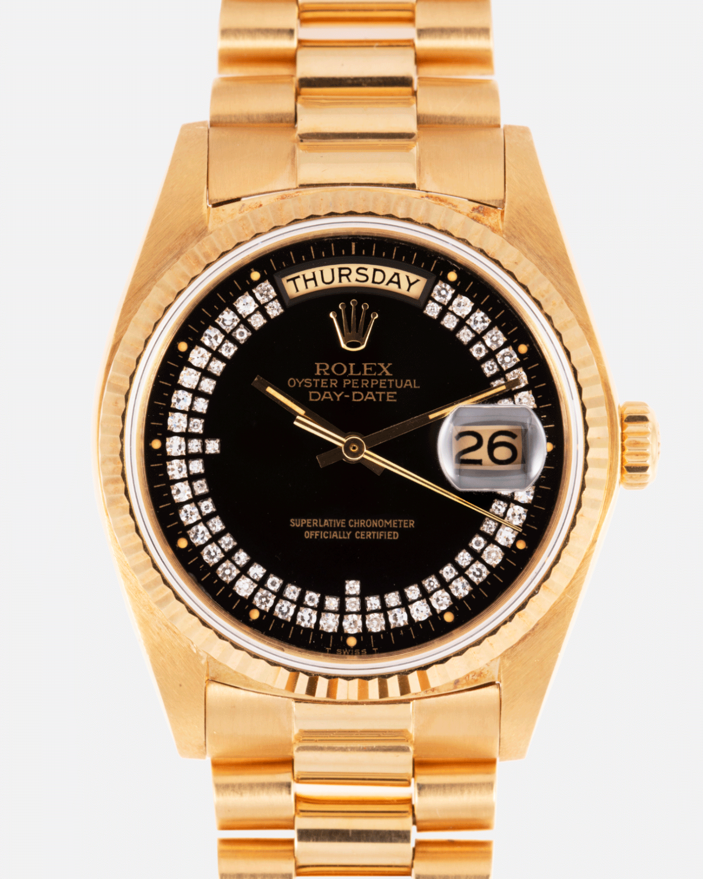 Brand: Rolex Year: 1982 Model: Day Date Reference Number: 18038 Material: 18k Yellow Gold Movement: Cal. 3055 Case Diameter: 36mm Lug Width: 20mm Bracelet/Strap: Rolex 18k Solid Gold President Bracelet