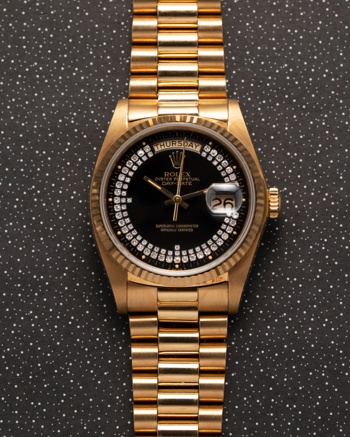 Brand: Rolex Year: 1982 Model: Day Date Reference Number: 18038 Material: 18k Yellow Gold Movement: Cal. 3055 Case Diameter: 36mm Lug Width: 20mm Bracelet/Strap: Rolex 18k Solid Gold President Bracelet