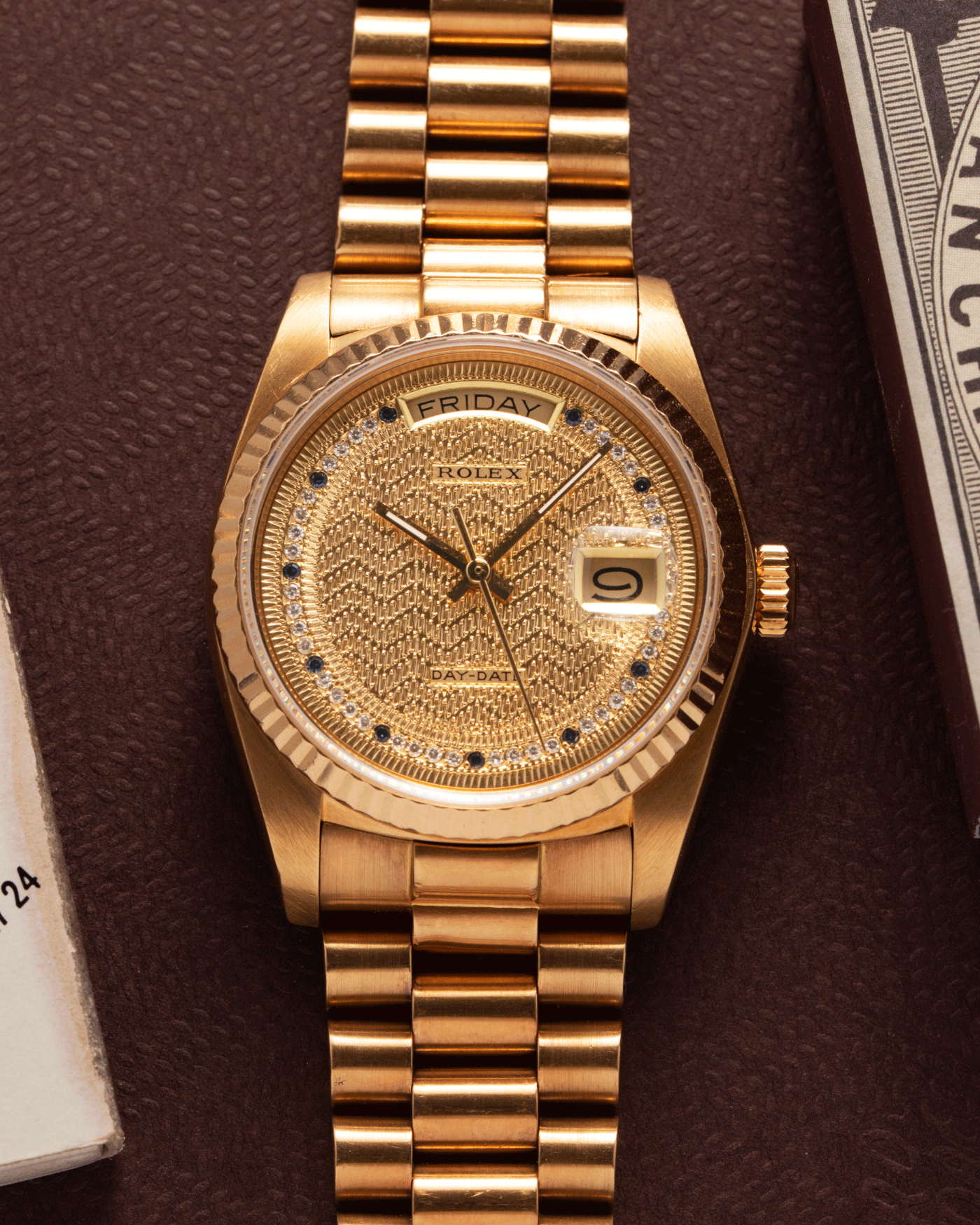 Brand: Rolex Year: 1987 Model: Day Date Reference Number: 18038 Serial Number: 9,6XX,XXX Material: 18k Yellow Gold Movement: Cal. 3055 Case Diameter: 36mm Lug Width: 20mm Bracelet/Strap: Rolex 18k Solid Gold President Bracelet