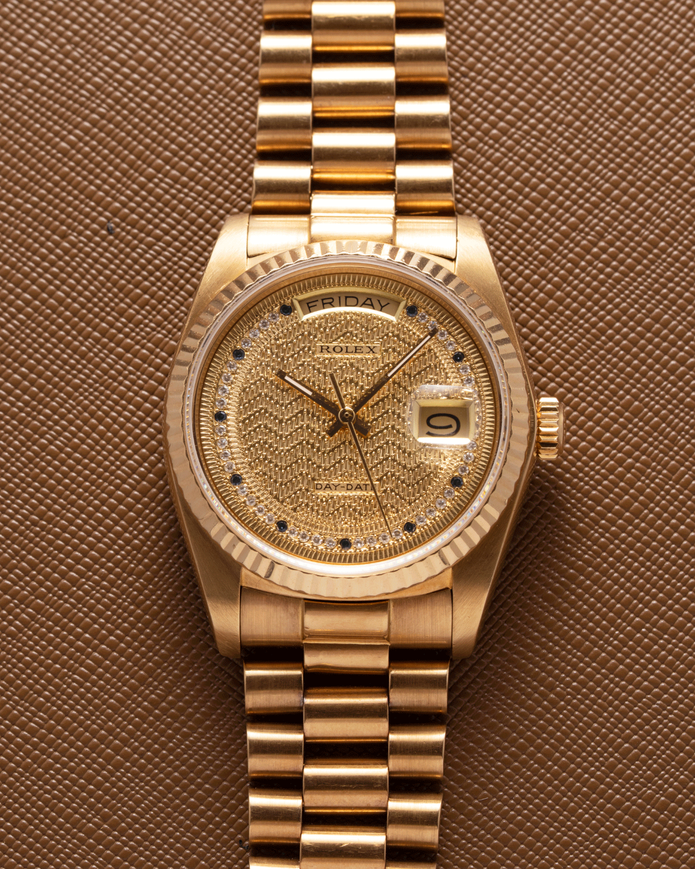 Brand: Rolex Year: 1987 Model: Day Date Reference Number: 18038 Serial Number: 9,6XX,XXX Material: 18k Yellow Gold Movement: Cal. 3055 Case Diameter: 36mm Lug Width: 20mm Bracelet/Strap: Rolex 18k Solid Gold President Bracelet