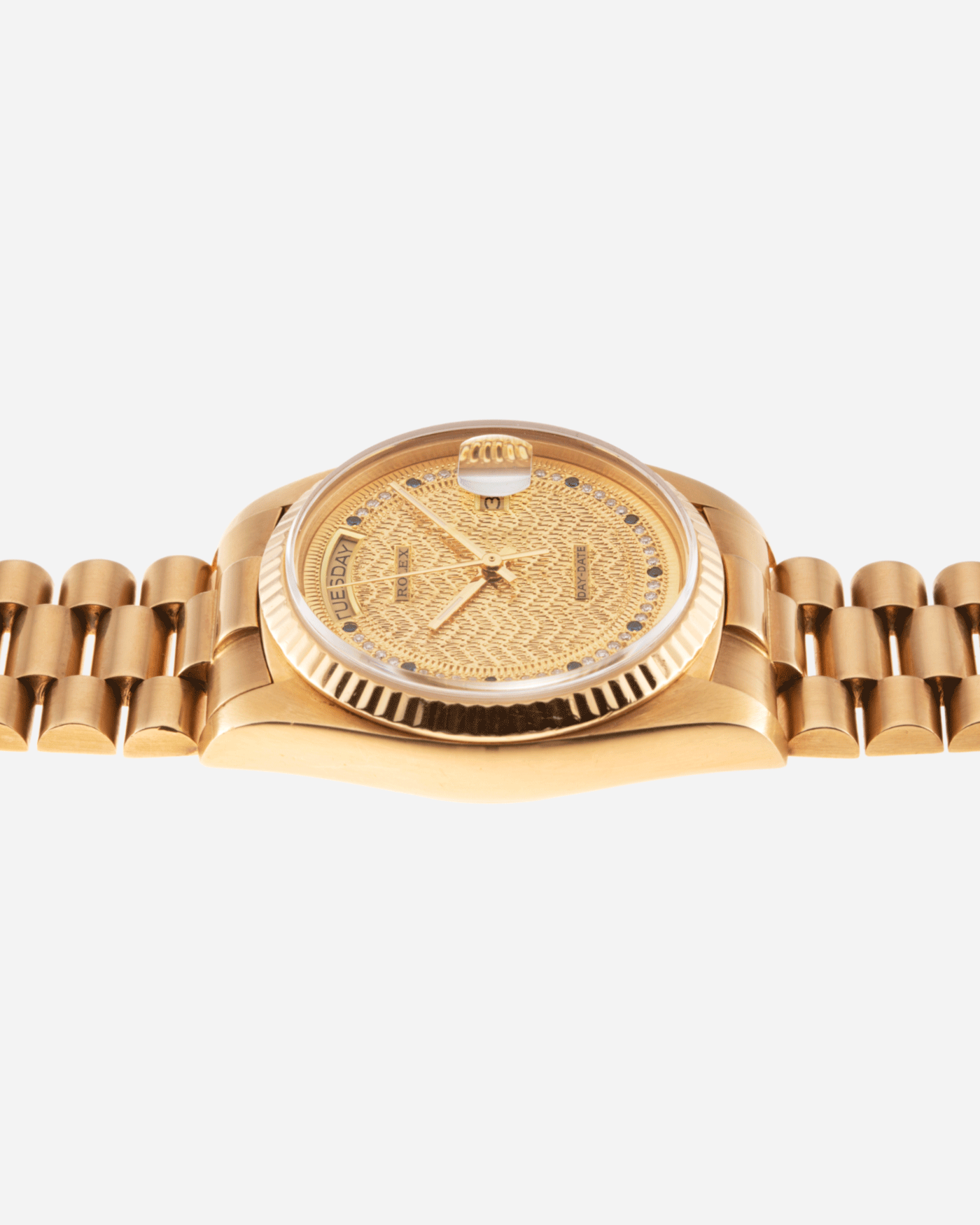 Brand: Rolex Year: 1987 Model: Day Date Reference Number: 18038 Serial Number: 9,6XX,XXX Material: 18k Yellow Gold Movement: Cal. 3055 Case Diameter: 36mm Lug Width: 20mm Bracelet/Strap: Rolex 18k Solid Gold President Bracelet