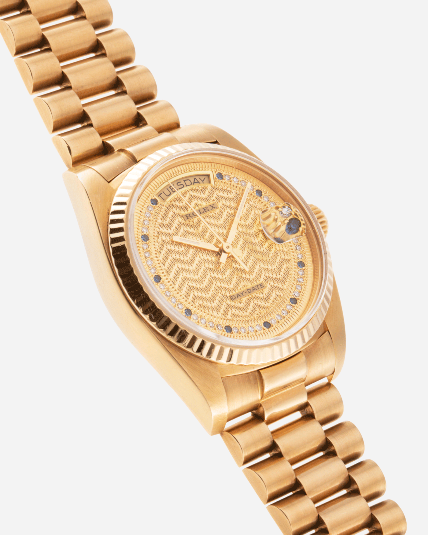 Brand: Rolex Year: 1987 Model: Day Date Reference Number: 18038 Serial Number: 9,6XX,XXX Material: 18k Yellow Gold Movement: Cal. 3055 Case Diameter: 36mm Lug Width: 20mm Bracelet/Strap: Rolex 18k Solid Gold President Bracelet