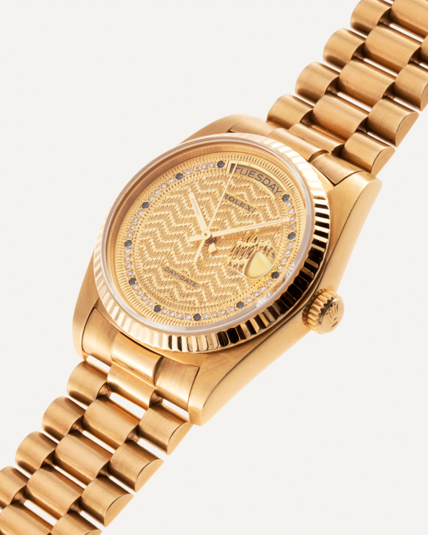 Brand: Rolex Year: 1987 Model: Day Date Reference Number: 18038 Serial Number: 9,6XX,XXX Material: 18k Yellow Gold Movement: Cal. 3055 Case Diameter: 36mm Lug Width: 20mm Bracelet/Strap: Rolex 18k Solid Gold President Bracelet