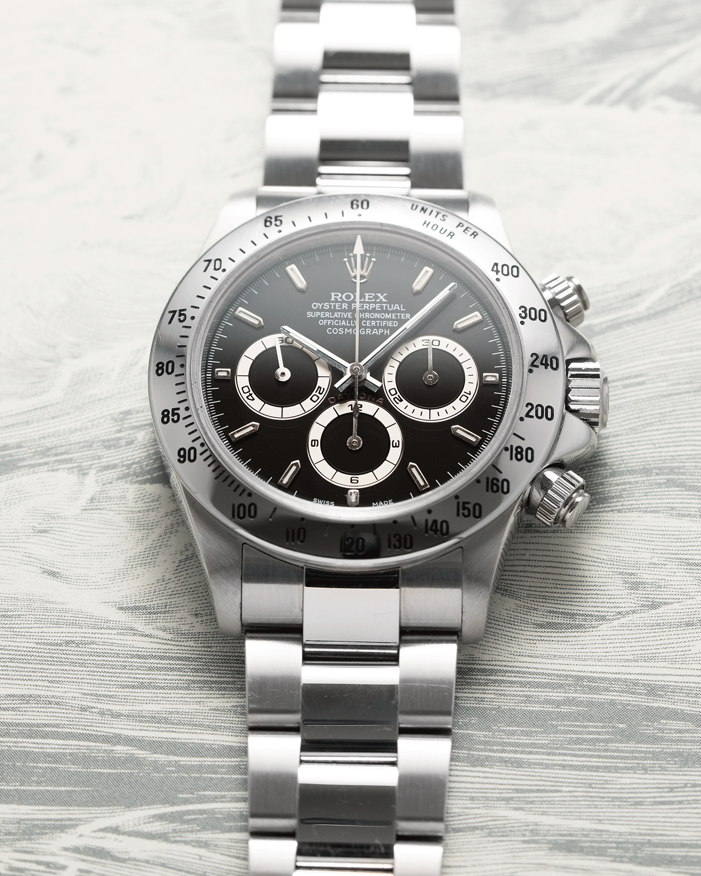 Brand: Rolex Year: 2000 Model: Cosmograph Daytona Reference Number: 16520 Material: Stainless Steel Movement: Rolex Zenith El Primero Caliber 4030  Case Diameter: 40mm Bracelet: Stainless Steel Rolex Oyster Bracelet