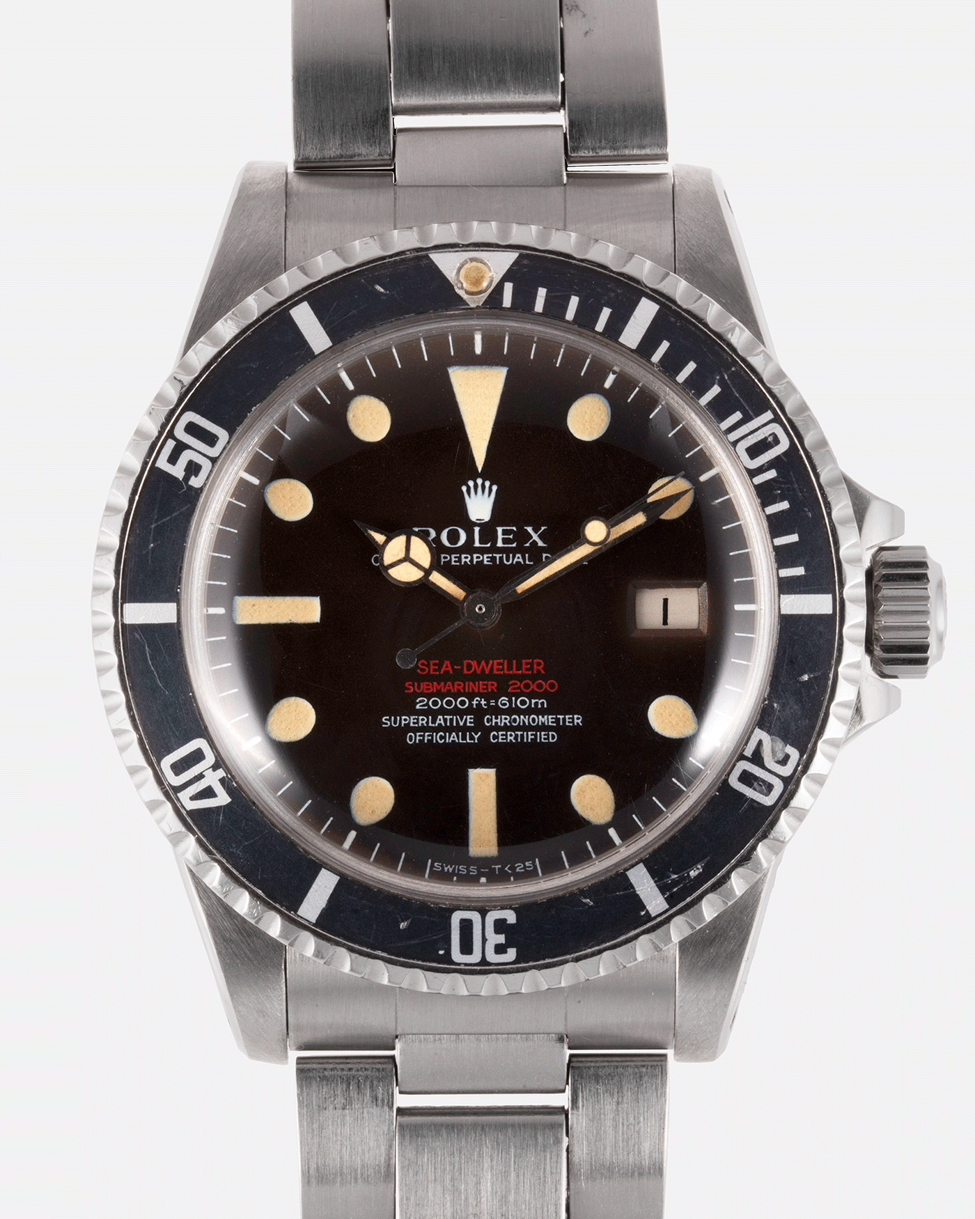 Brand: Rolex Year: 1973 Model: Sea Dweller Reference Number: 1665 Serial Number: 3.7 Mil Material: Stainless Steel Movement: Cal. 1570 Case Diameter: 40mm Lug Width: 20mm Bracelet/Strap: Rolex Pateted 9315 Folded Bracelet with 585 Endlinks 