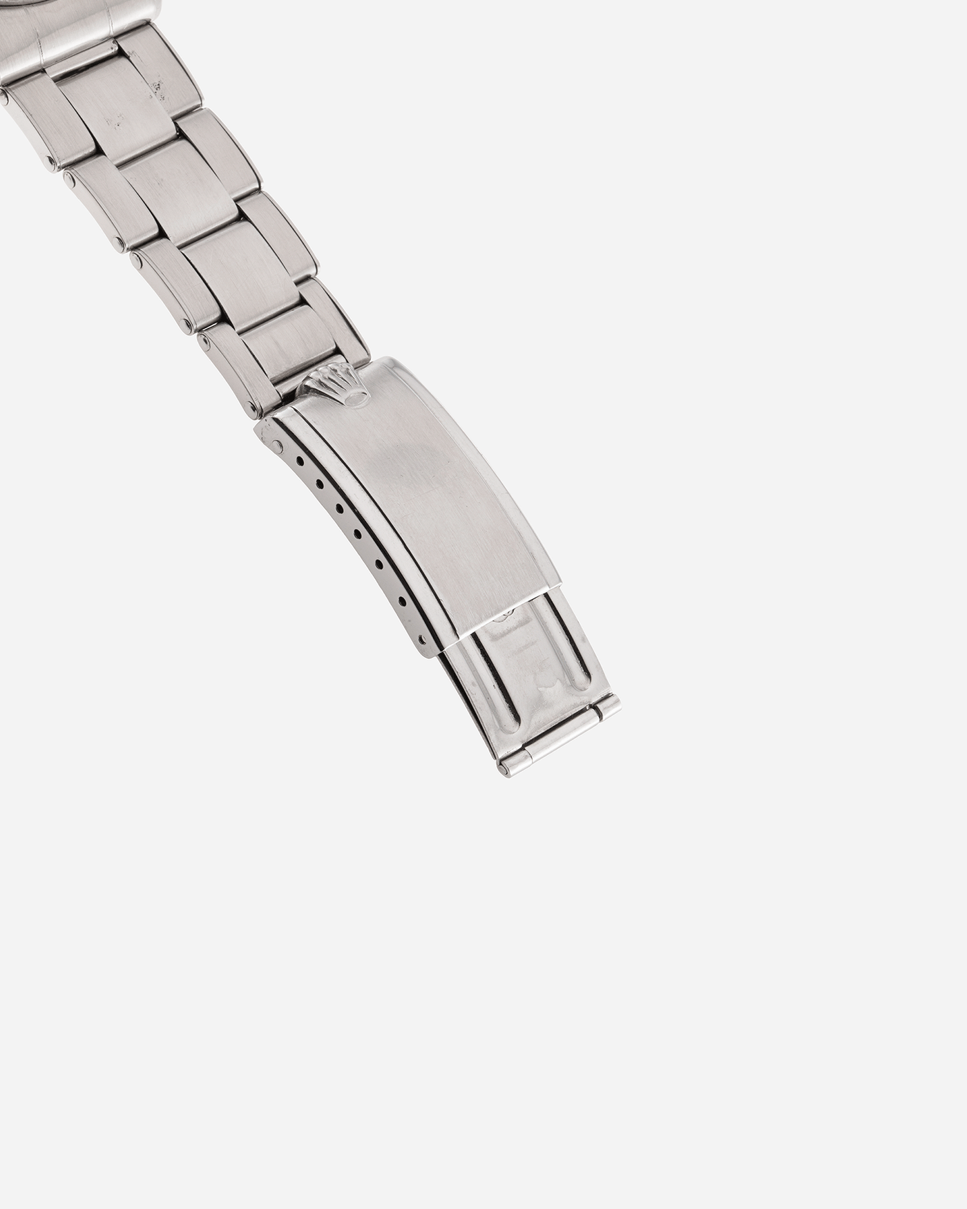 Brand: Rolex Year: Circa 1962 Model: Explorer Reference Number: 1016 Serial Number: 74XXXX Material: Stainless Steel Movement: Cal. 1560 Case Diameter: 36mm Lug Width: 20mm Bracelet/Strap: Rolex 7206 Rivet Bracelet with 58 end links dated 4.62
