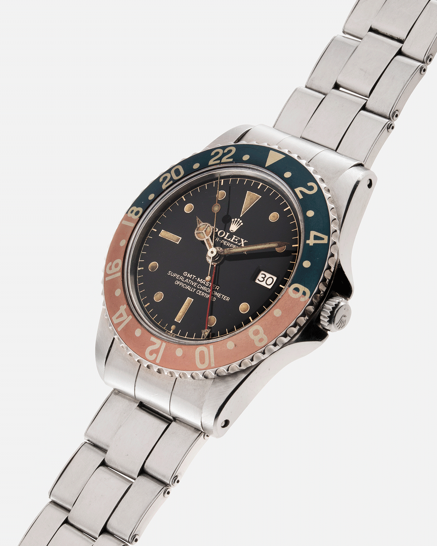 Brand: Rolex Year: 1963 Model: GMT-Master Reference Number: 1675 Serial Number: 87XXXX Material: Stainless Steel Movement: Cal. 1565 Case Diameter: 40mm Lug Width: 20mm Bracelet/Strap: Stainless Steel Rolex C&I Riveted Elastic Bracelet