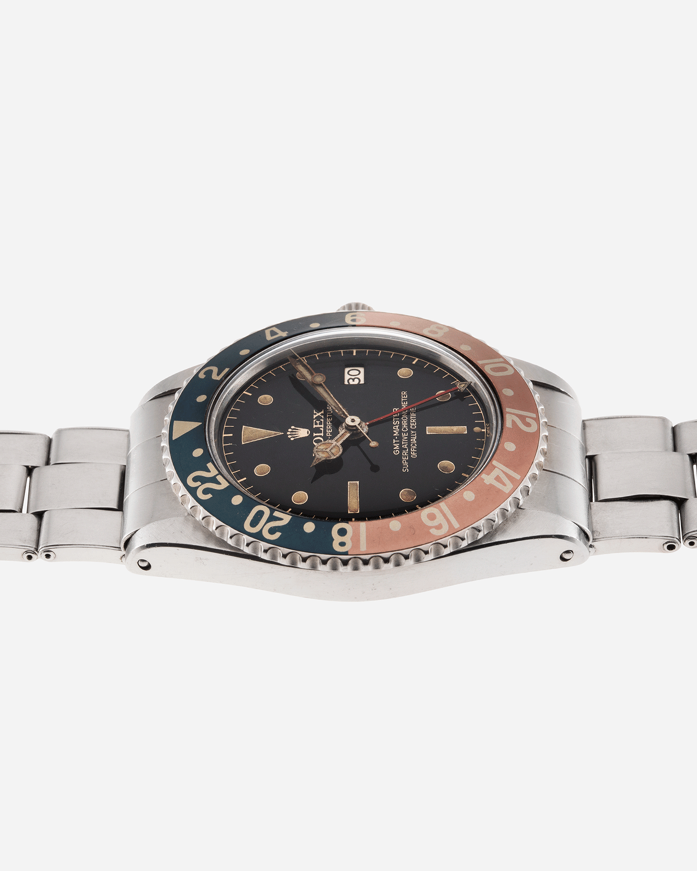 Brand: Rolex Year: 1963 Model: GMT-Master Reference Number: 1675 Serial Number: 87XXXX Material: Stainless Steel Movement: Cal. 1565 Case Diameter: 40mm Lug Width: 20mm Bracelet/Strap: Stainless Steel Rolex C&I Riveted Elastic Bracelet