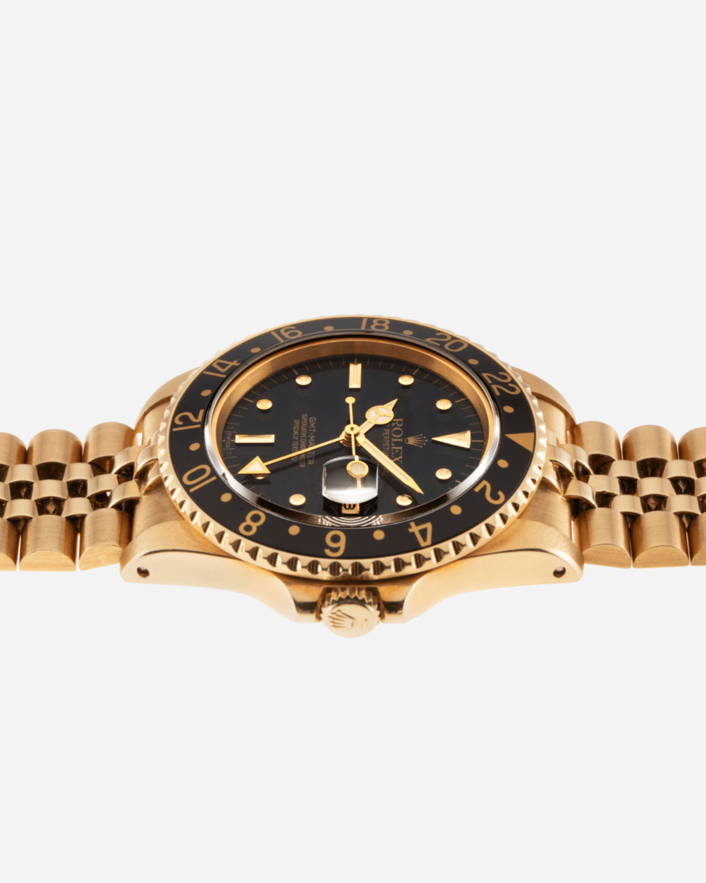 Brand: Rolex Year: 1985 Model: GMT-Master Reference Number: 1675 Serial Number: 8.7 mil Material: 18k Yellow Gold Movement: Cal. 1570 Case Diameter: 40mm Lug Width: 20mm Strap: 18k Yellow Gold Rolex 8386 Jubilee Bracelet with ’47’ End Links